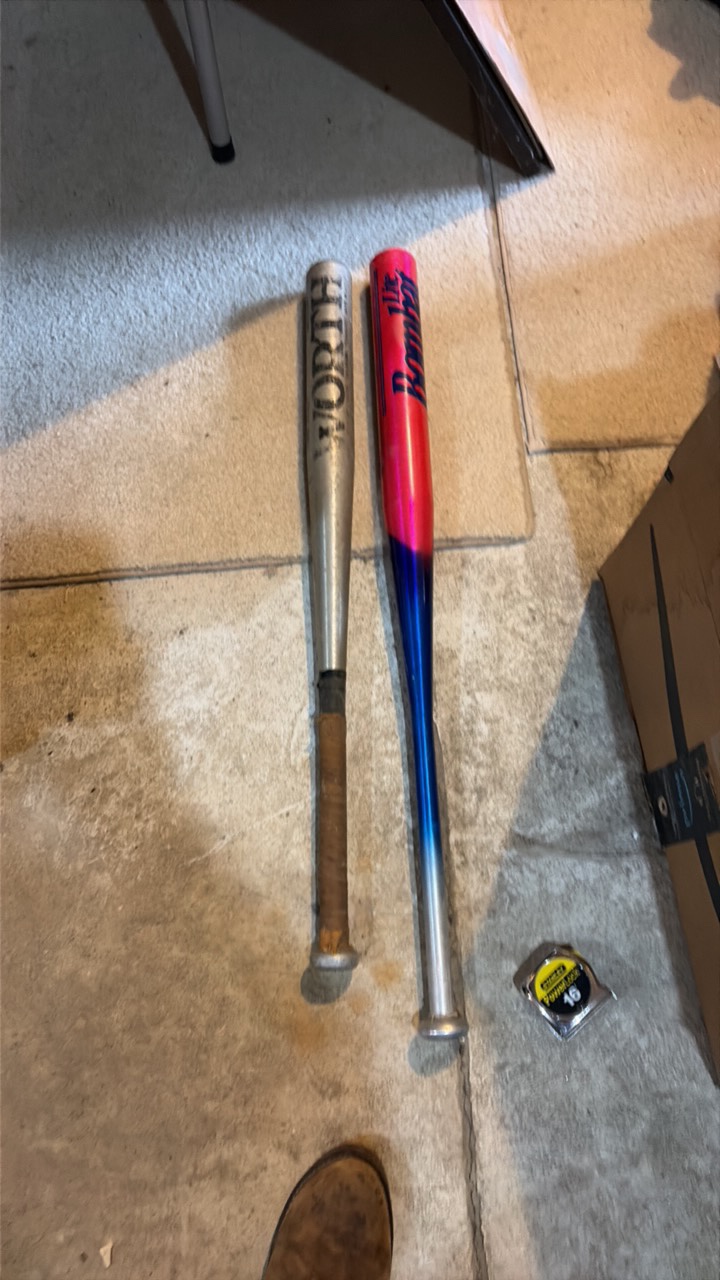 two metal baseball bats