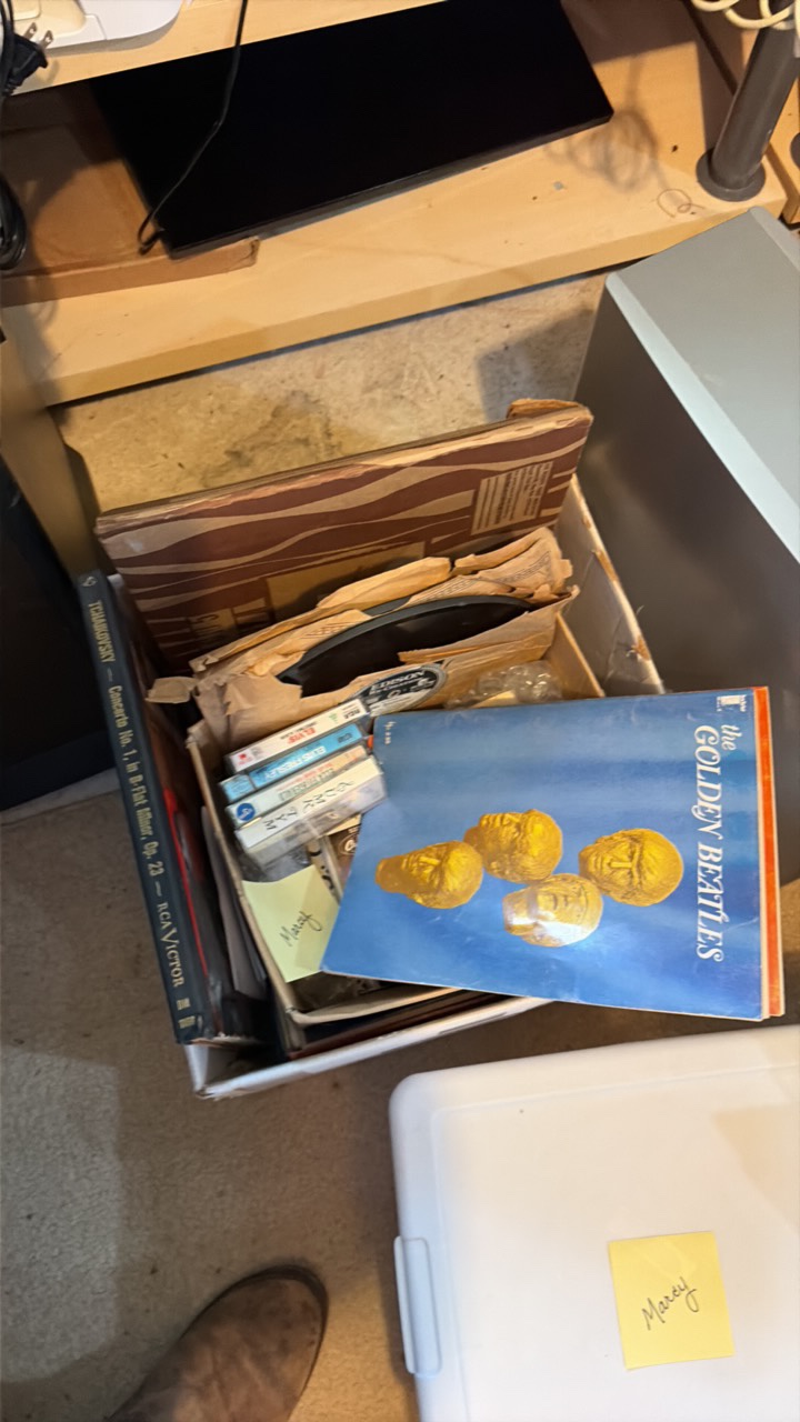 box of tapes and records. vintage music collectibles