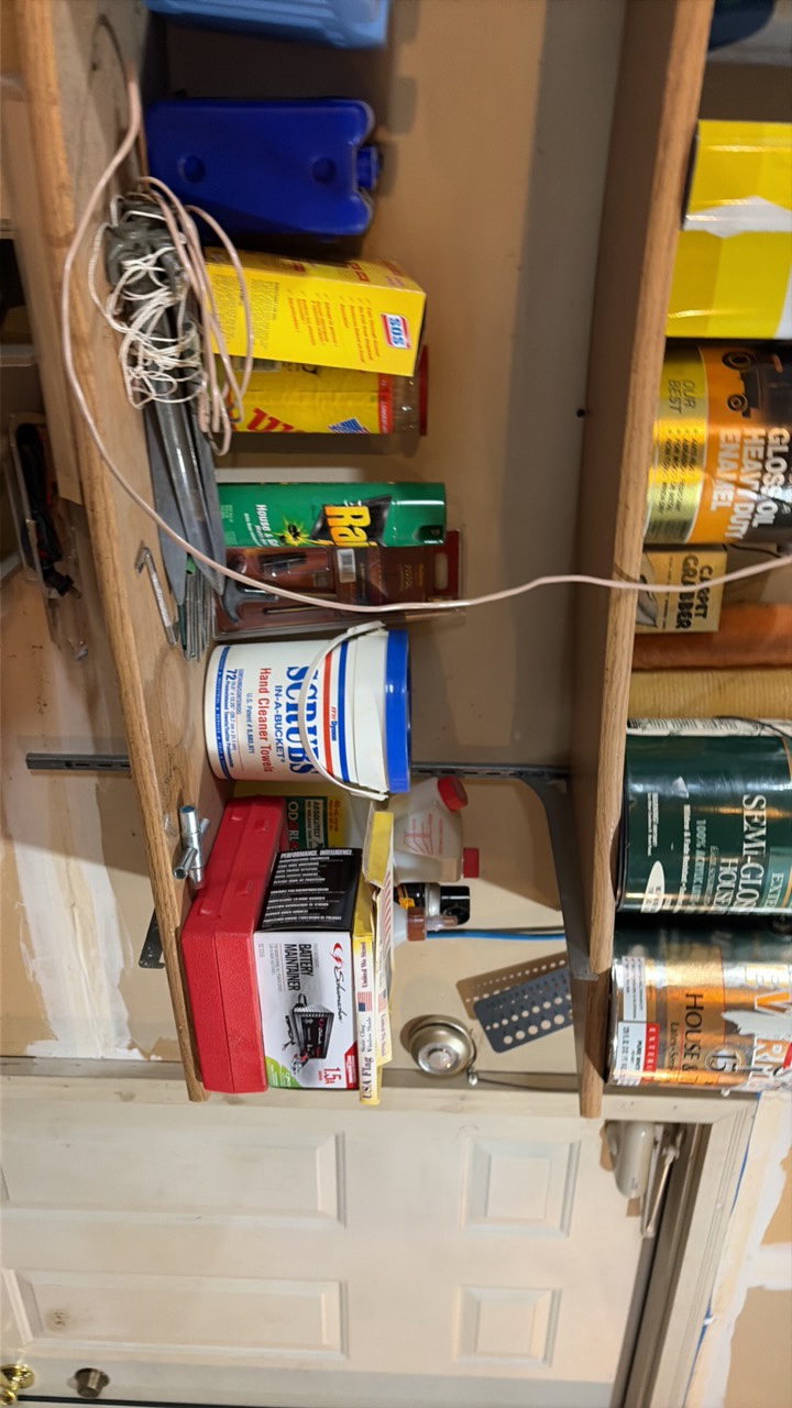 shelf contents including- various scrubbing- bug killing- ice packs- acrylic primer- spray adhesive- bone meal