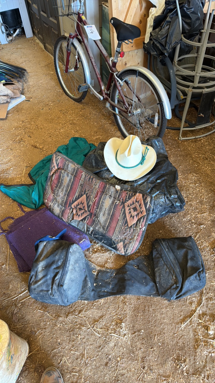 cowboy hat and contents, including gun bag & blankets