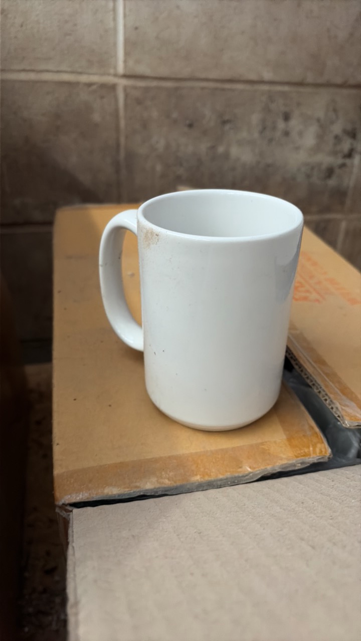 two boxes containing mighty mug 15 ounce coffee cups