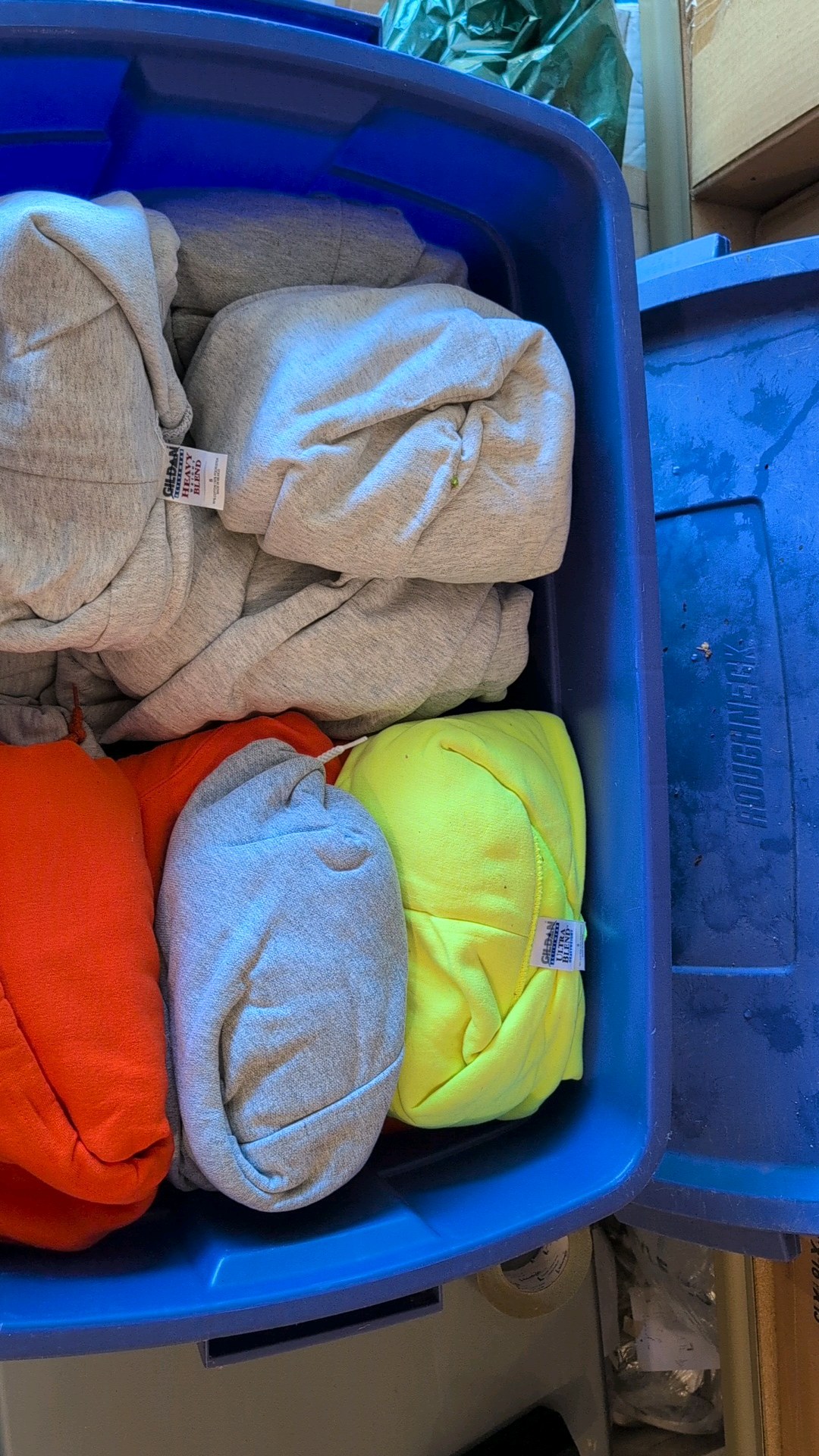 Bin of sweatshirts as pictured