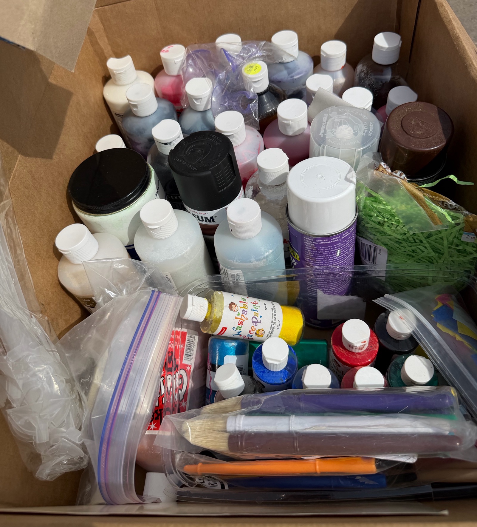 paints brushes, bells, heart doilies stencils