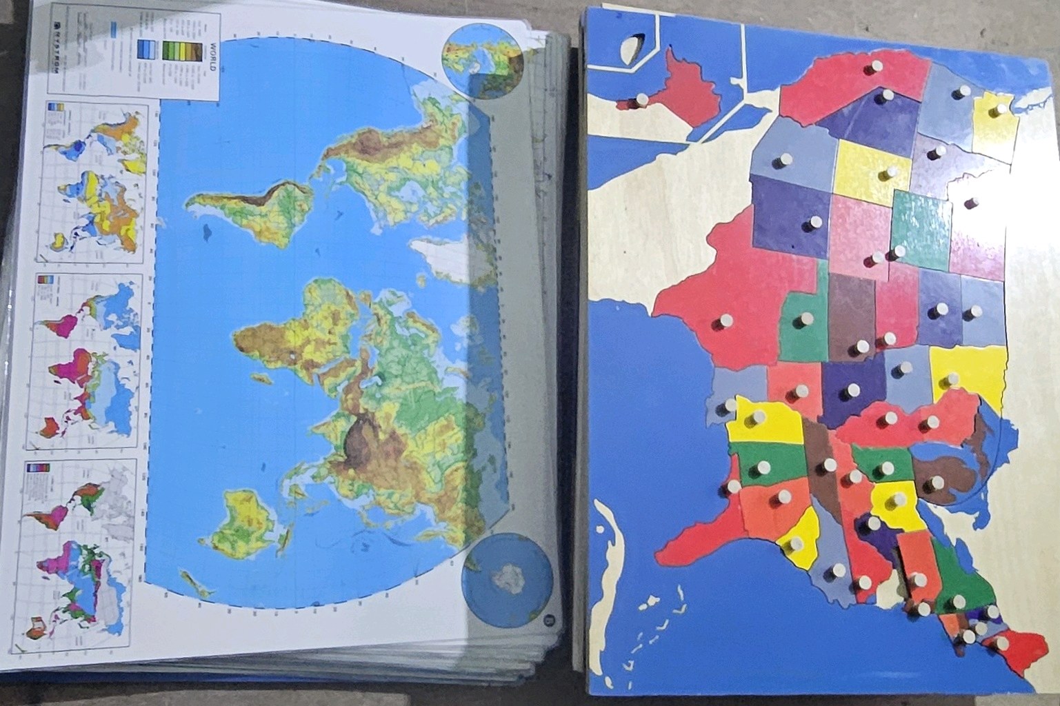 Large box of wooden and laminated maps