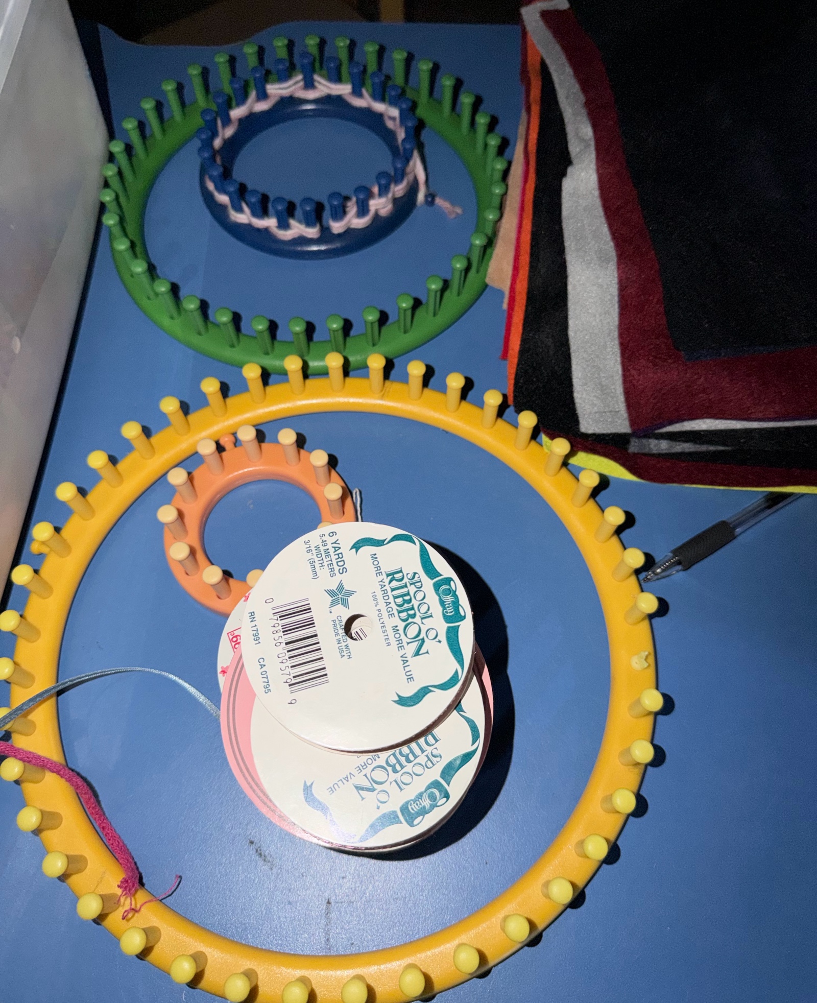 looms, ribbon, fabric, and yarn