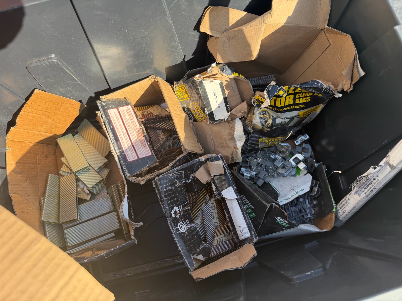 tote of nails, staples, strings, and ties
