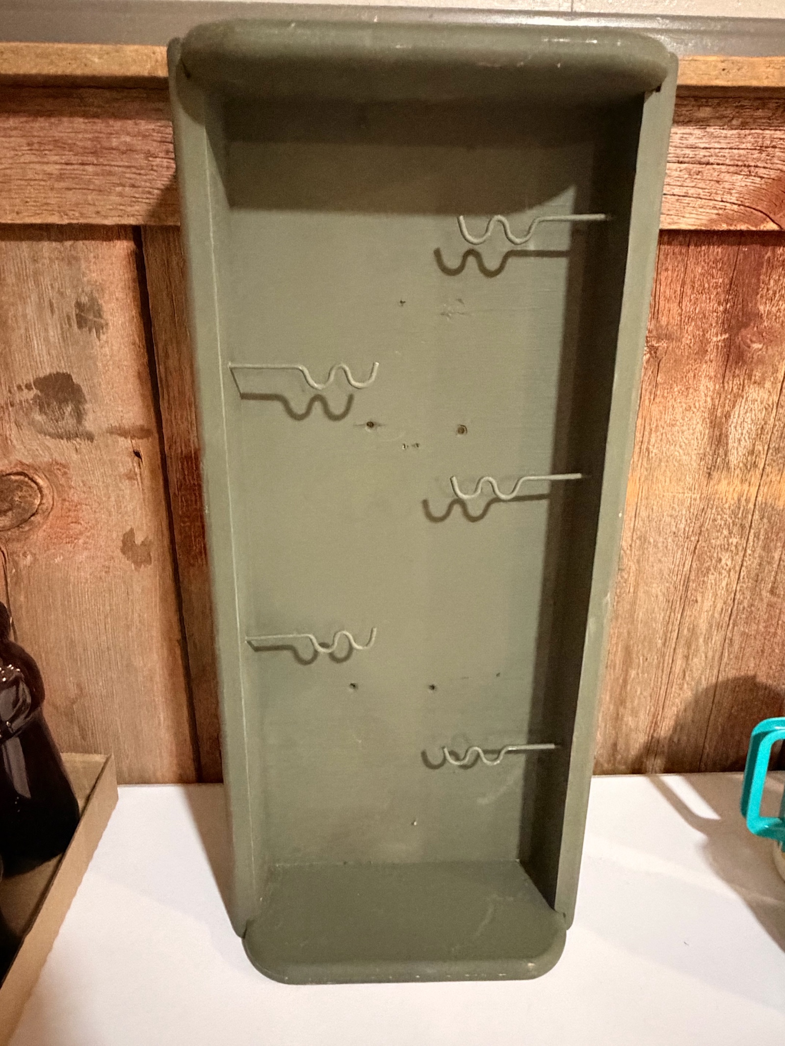 vintage wall-mounted storage rack
