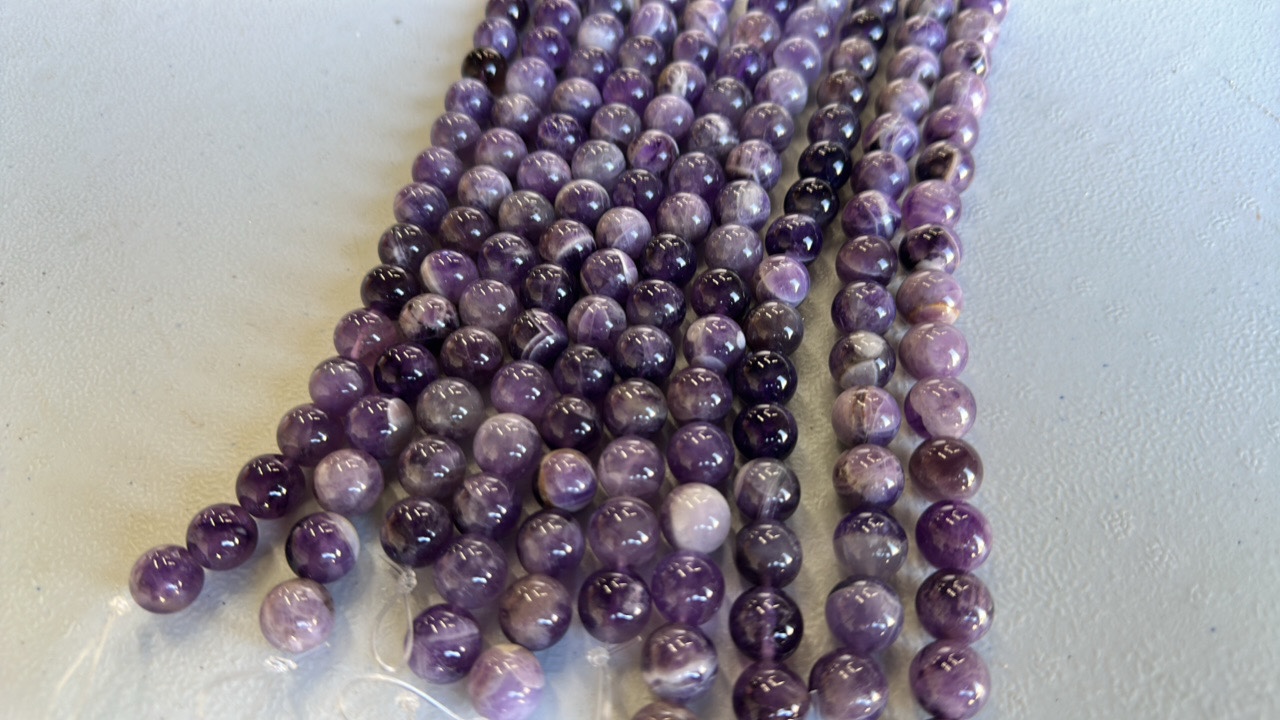 10 strands of chevron Amethyst in 12mm round in 8 strand (Lot of 10)