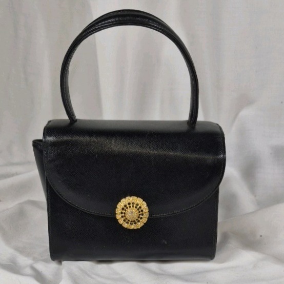 Black Structured Top Handle Handbag With Gold Clasp
