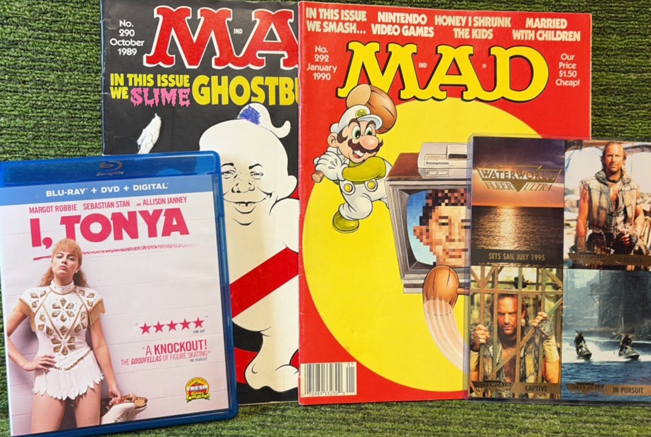 Entertainment Lot- I,Tonya Blue Ray, 2 Mad Magazines from October 1989 and January 1990, and Waterworld Clear Ultra Movie Promotion Card