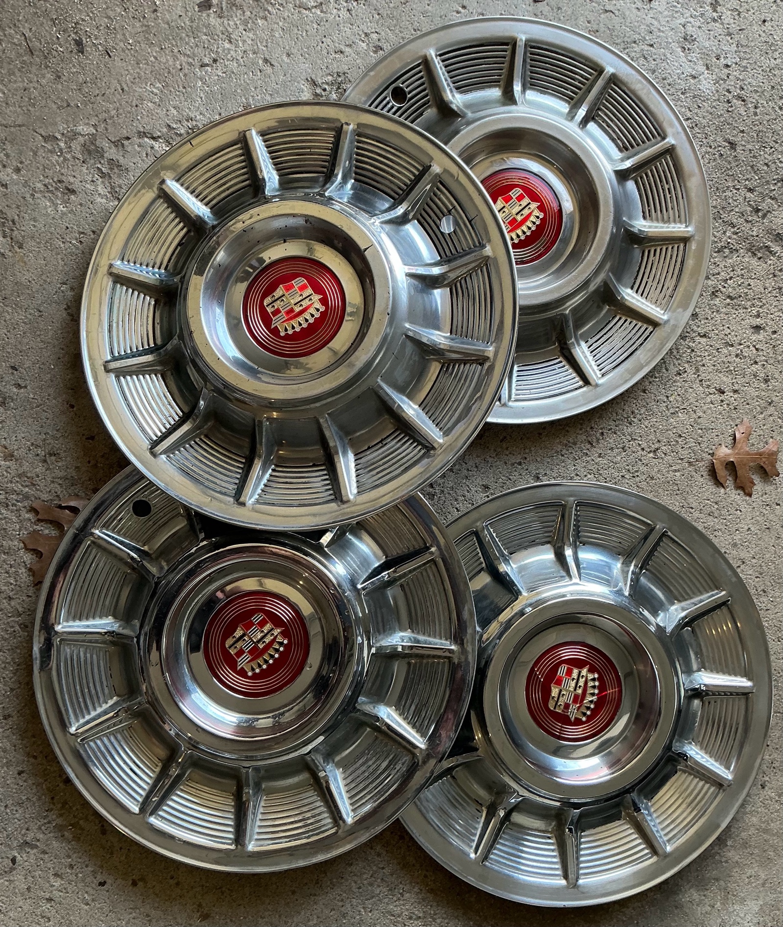 1957 Cadillac chrome sombrero hubcaps set of 4