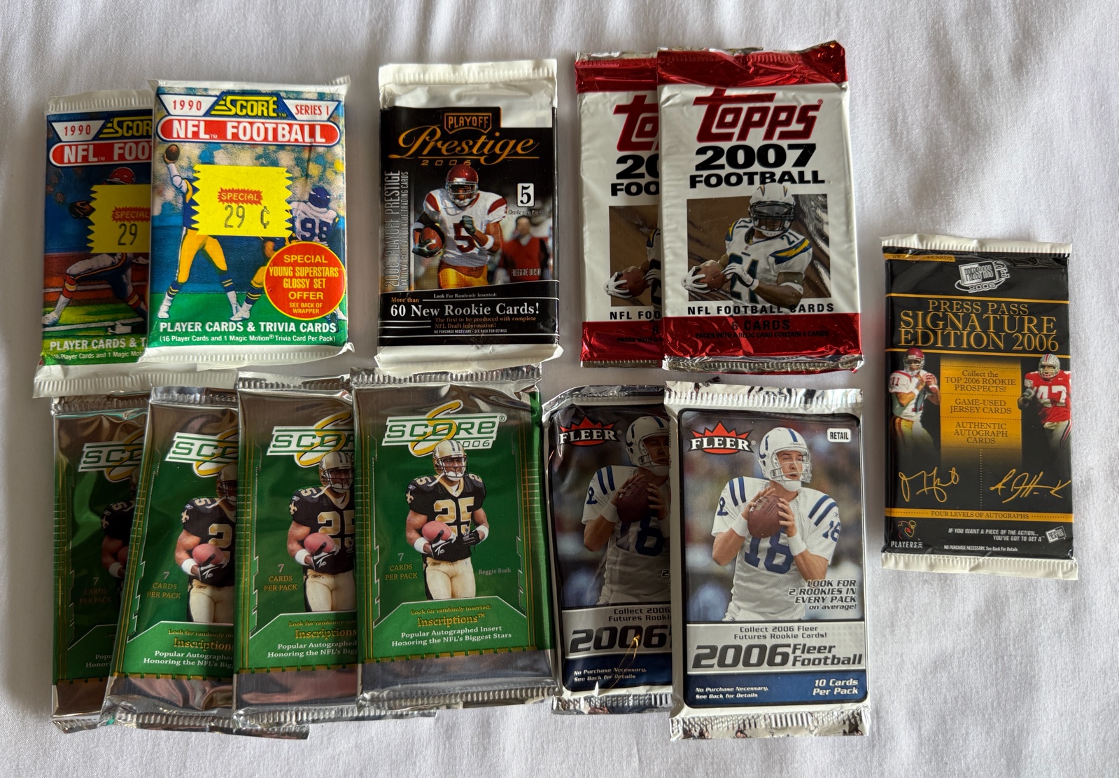 (12) Football Card Packs - Topps, Fleer, Score and More