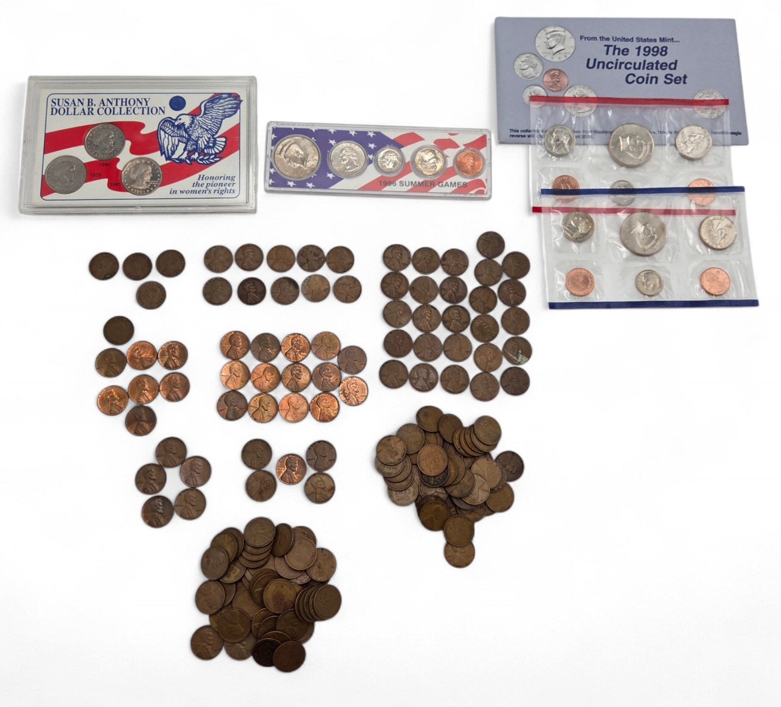 Susan B. Anthony Dollar Collection  1996 Summer Games Mint Strip  1998 Uncirculated Set  Aprox 1 LB Unsearched Pennies Lot