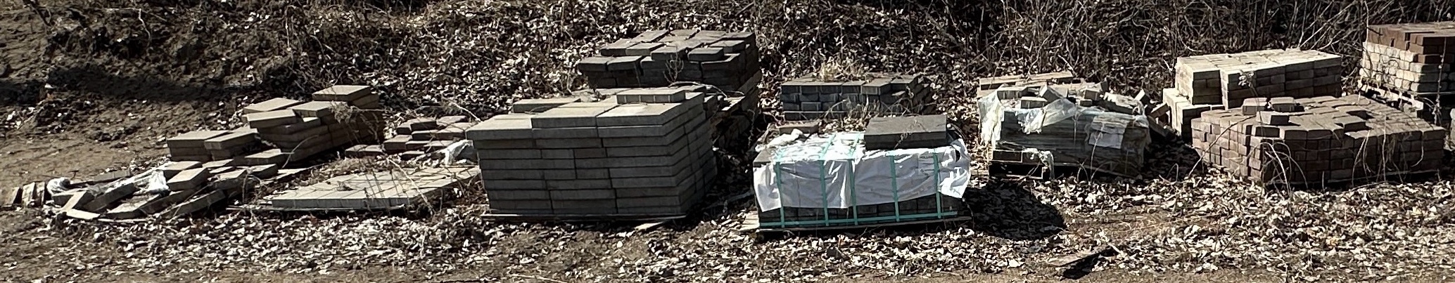 (16) Pallets of concrete pavers