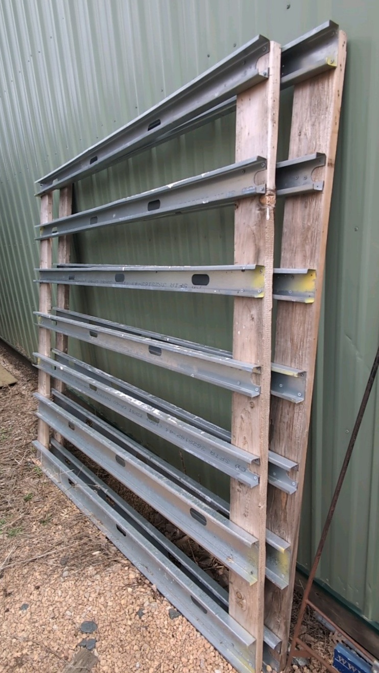 C-channel rails nailed to wood 2x4s