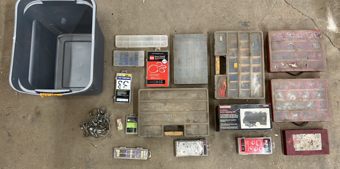Bin whose clamps, 21-piece drum sanding kit, nuts, bolts, screws, etc