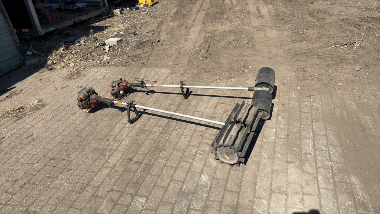 (2) Shindaiwa Power heads w Rubber Paddle Drum Attachments,