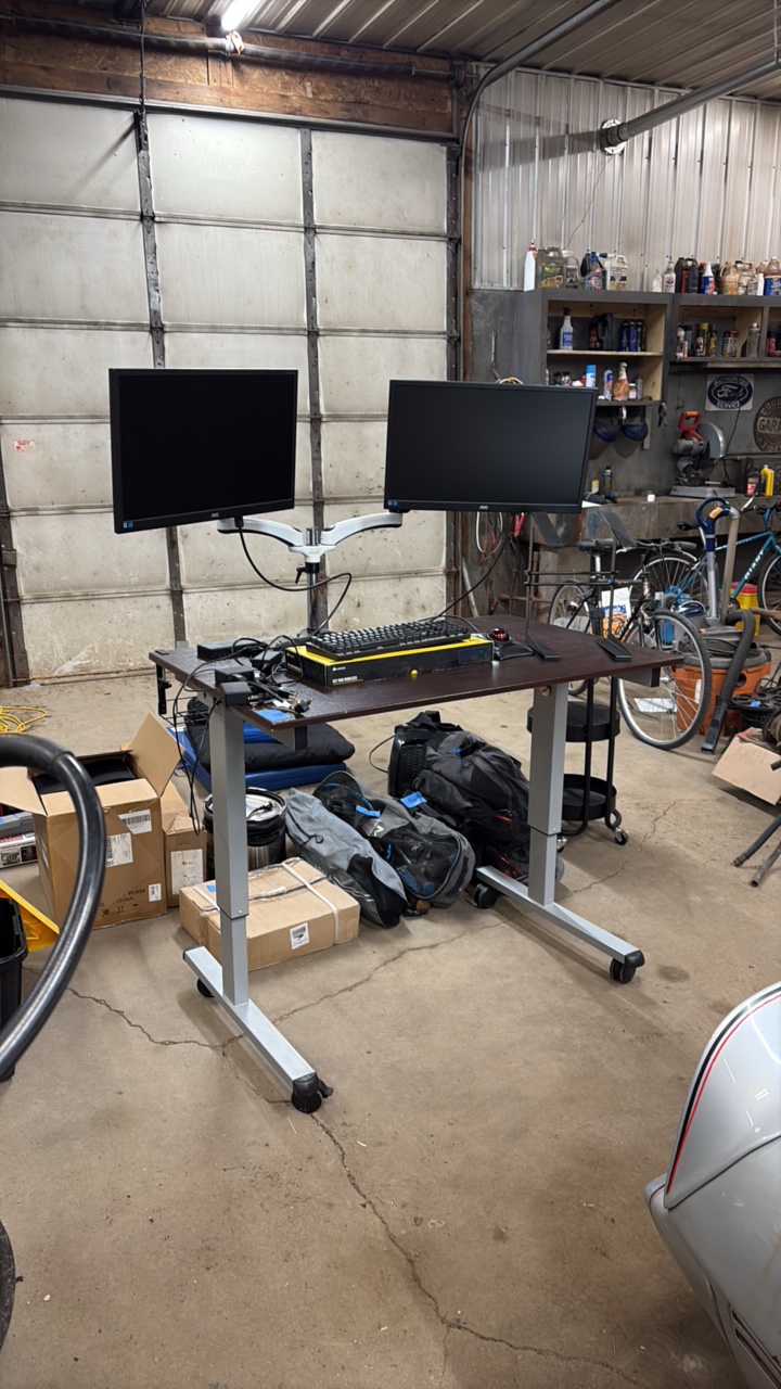 Adjustable table, 2 monitors with mount, key board, display link, and rolling ball mouse