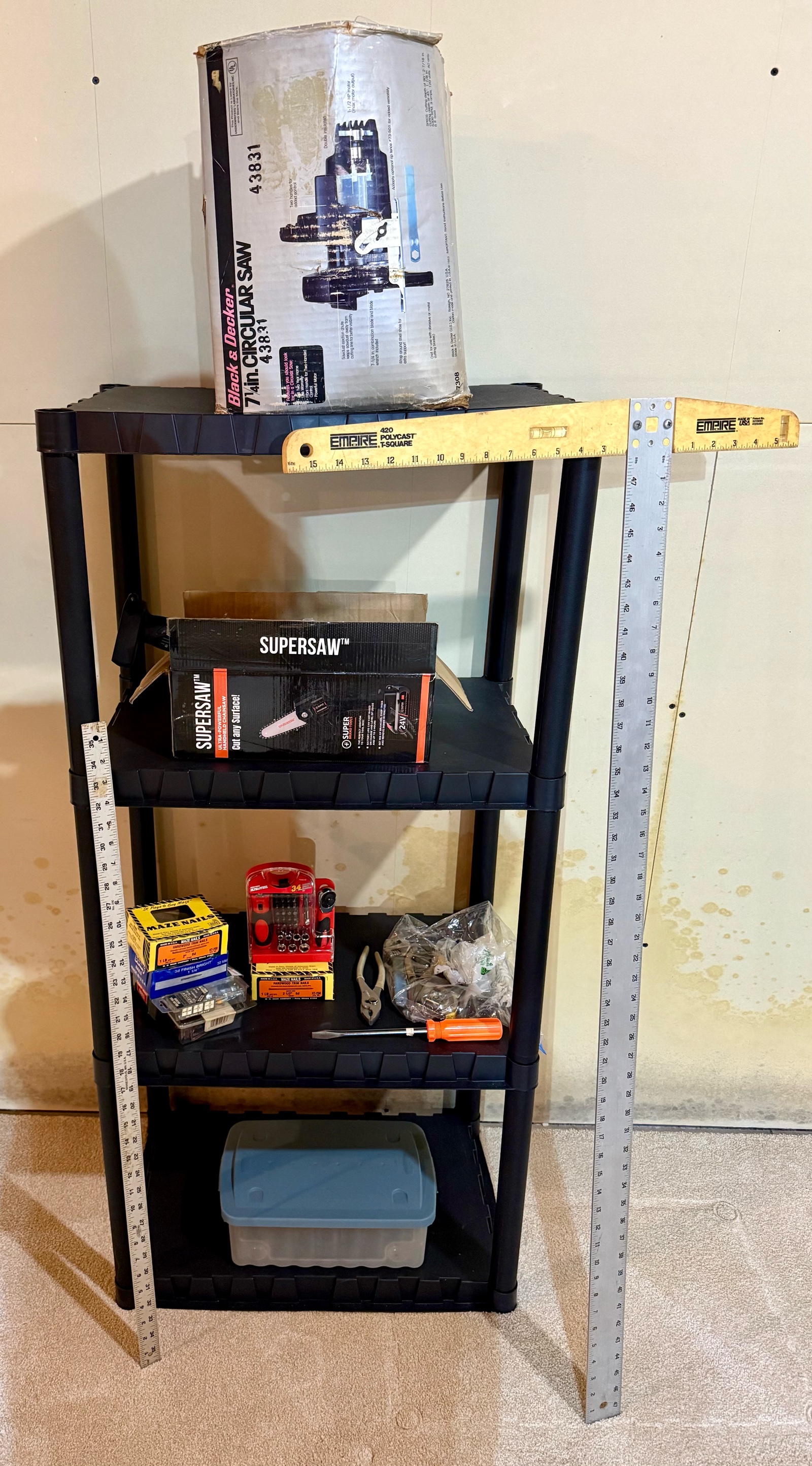 Small Black Plastic Utility Shelf & Tools