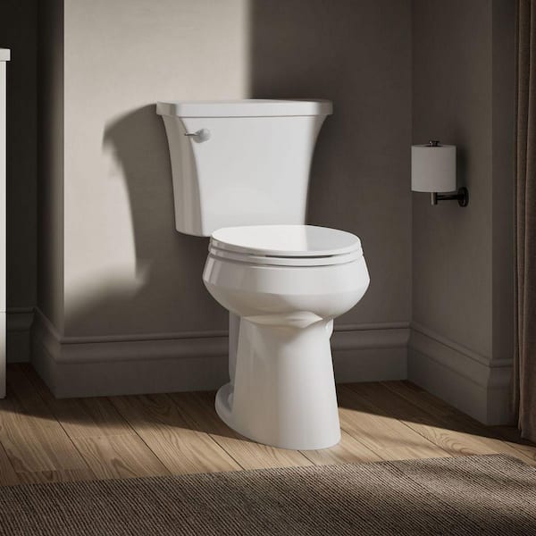 KOHLER Highline Arc 12 in. Rough In 2-Piece 1.28 GFP Single Flush Elongated Chair Height Toilet in White with Soft Close Seat