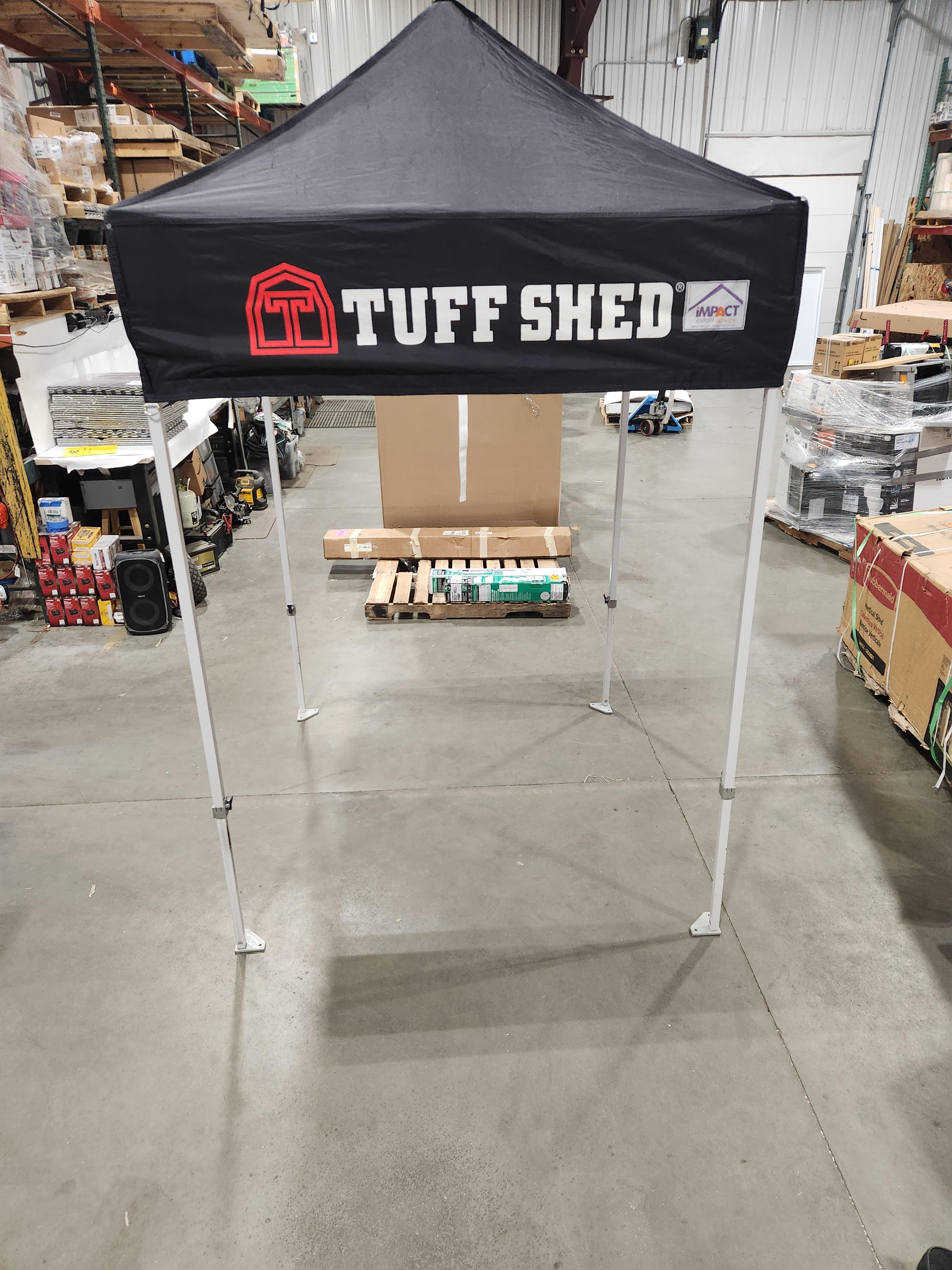 5 x 5 instant canopy. Used. Carrying case damaged.