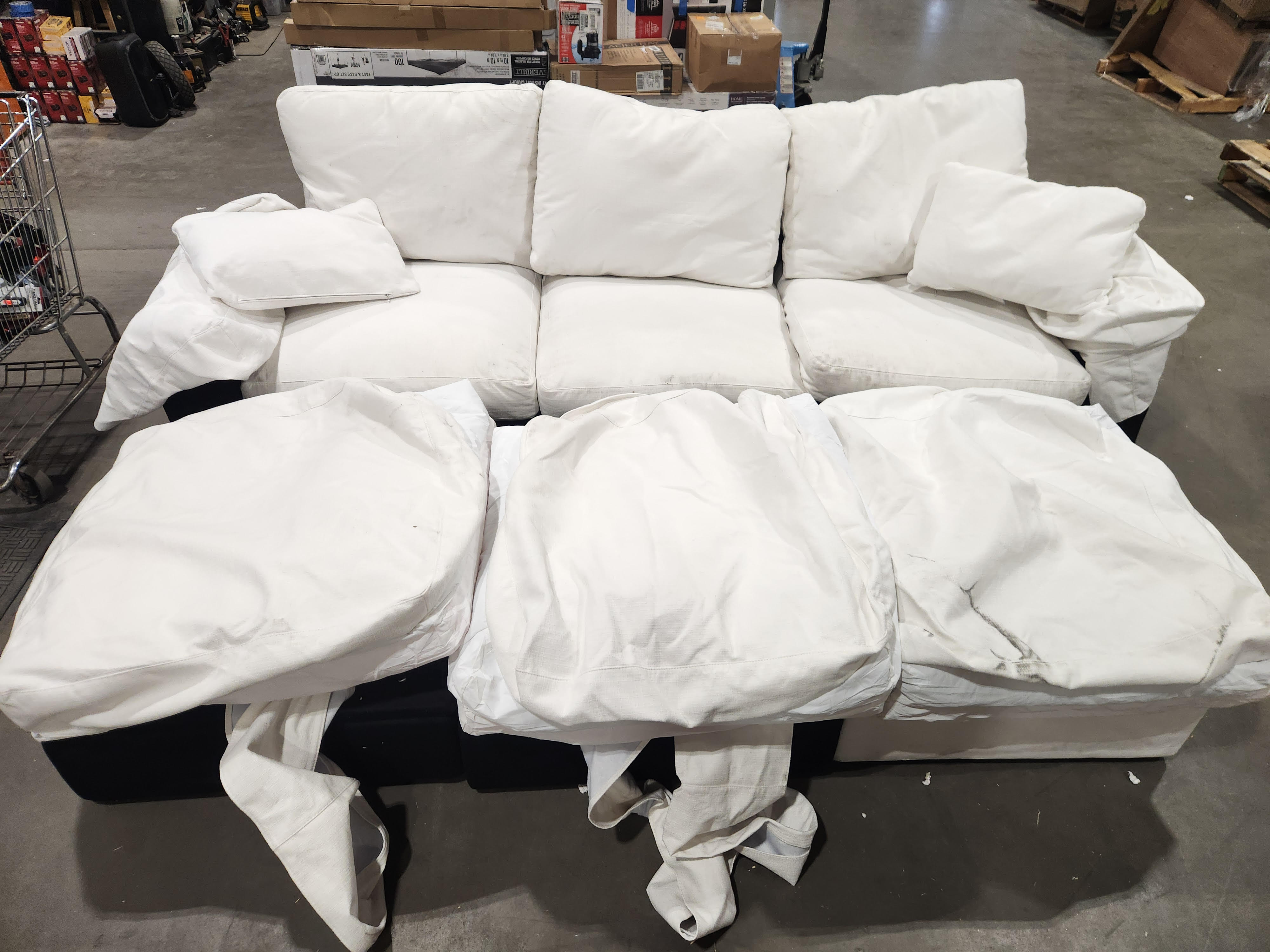 9 ft Cream colored Couch with foot rest