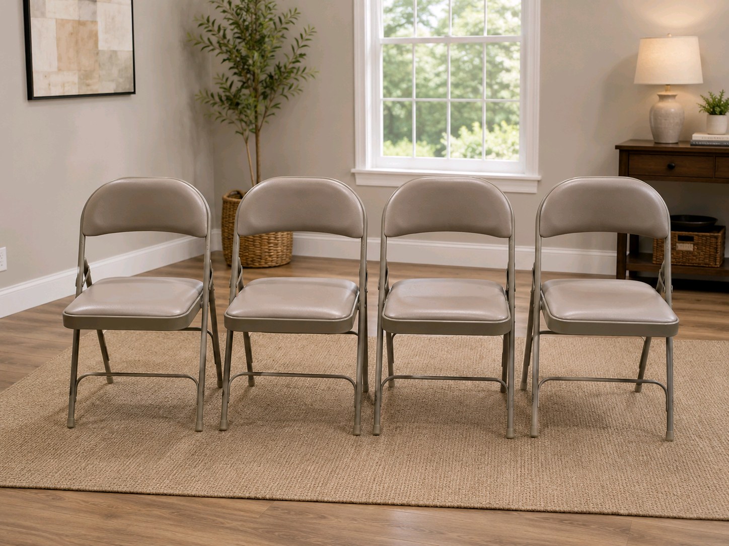 4 Uline H-2522 Padded Folding Chairs - Tan Vinyl Seat and Back