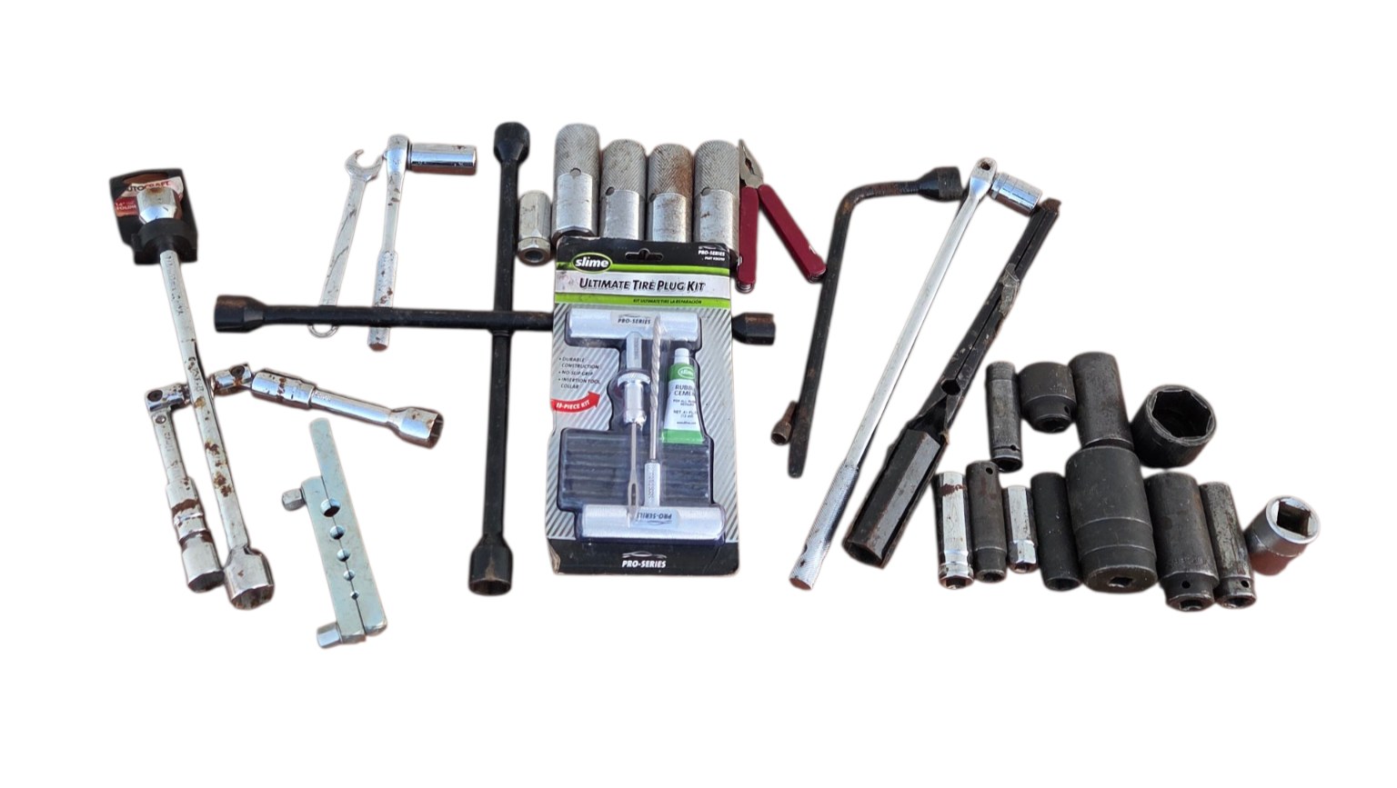 Mixed Automotive Tire Tool Lot  Lug Wrenches, Sockets, Tire Plug Kit & Hand Tools