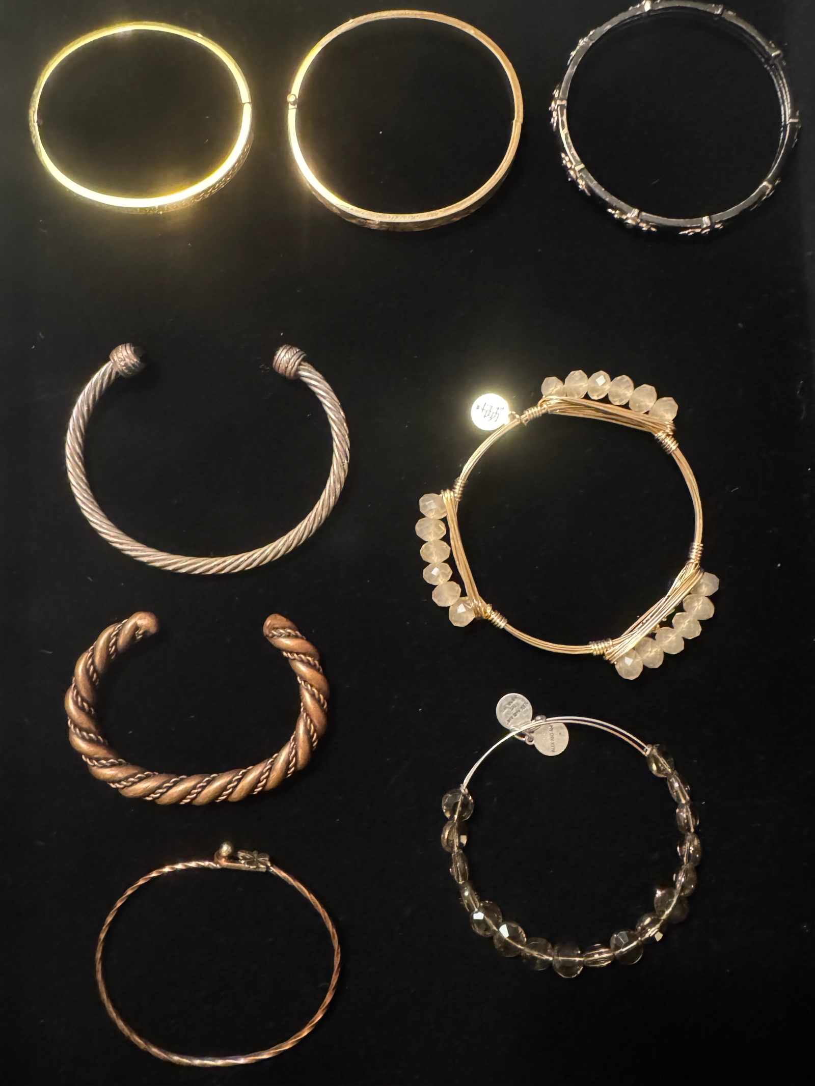 Gold and Copper bracelets