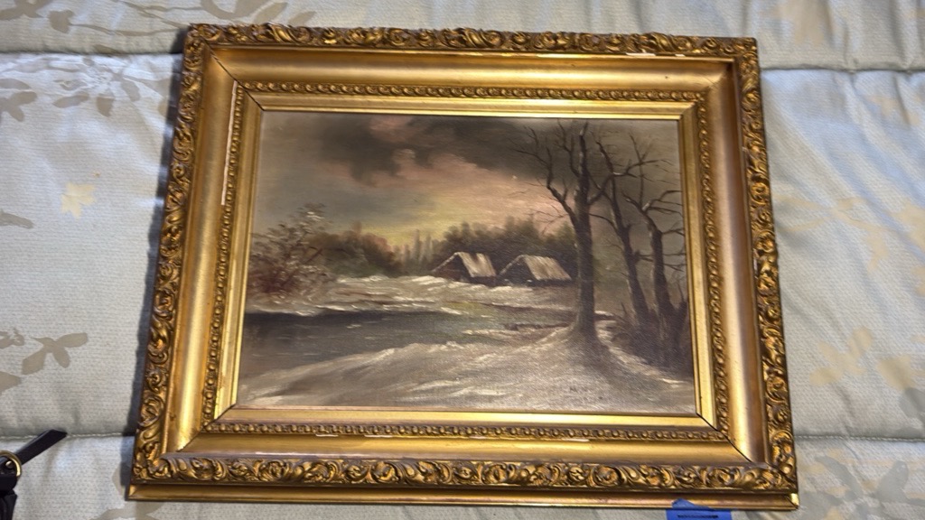 Ornate framed oil painting of a winter setting, signed