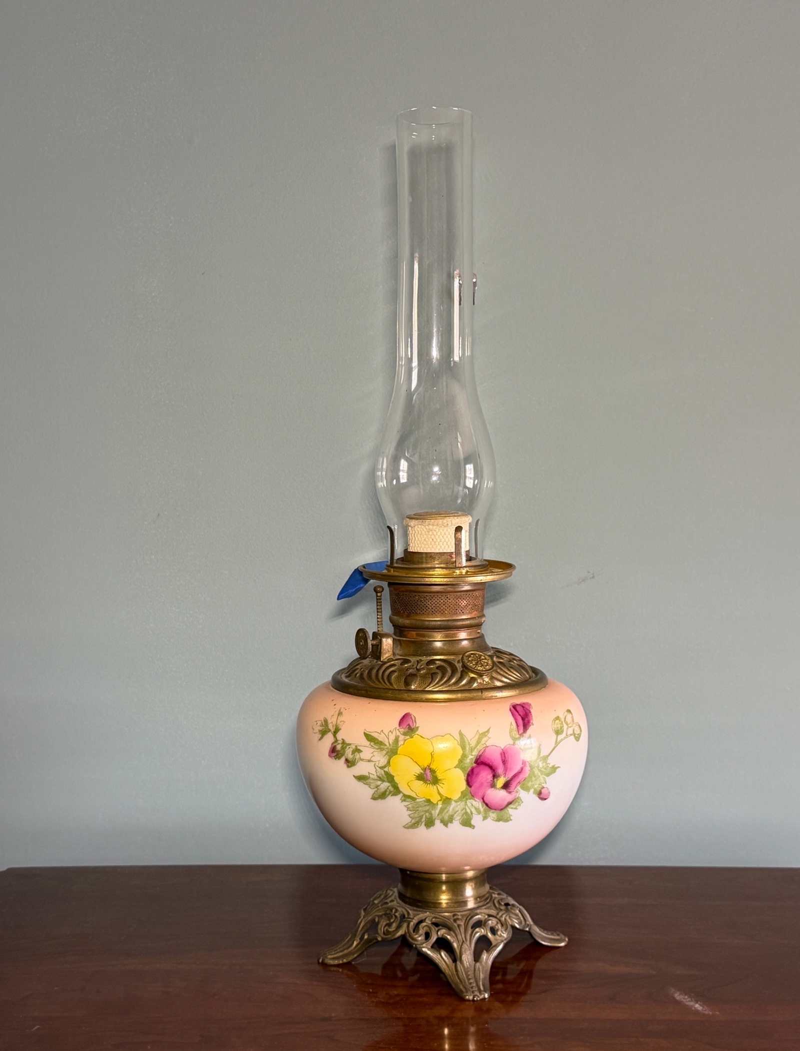 Antique oil lamp with handpainted base and chimney