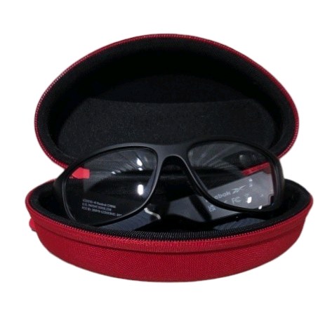 Retail value: about $390–$459 new Reebok Smart Eyewear LCD01041 With Case and Charging Cable
