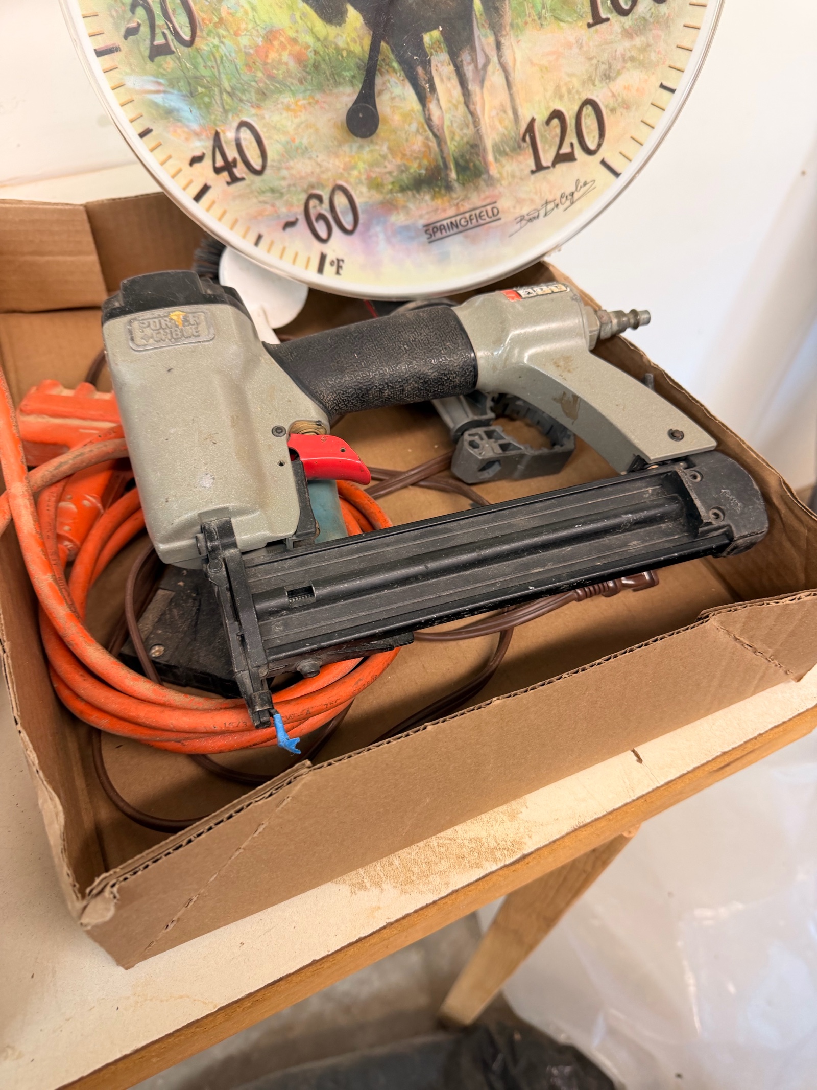 Lot of misc tools Nail Gun, thermometer, and other various items