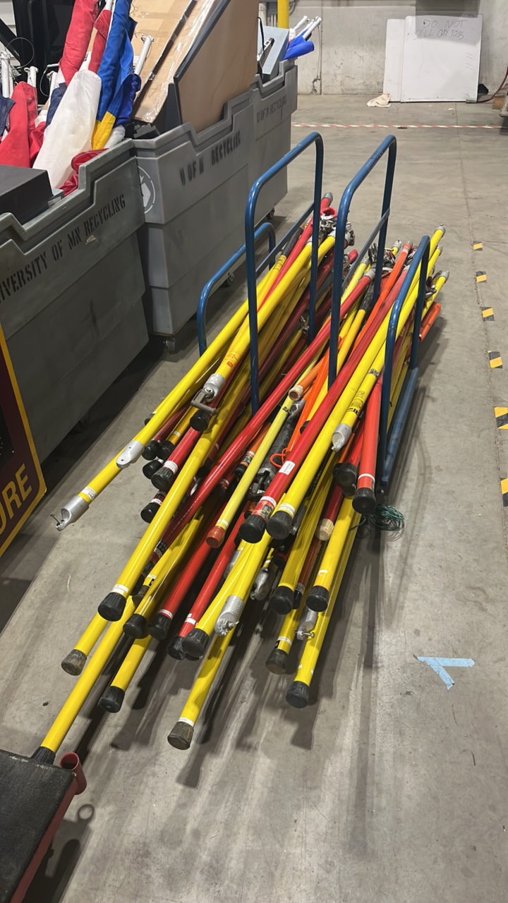 Stack of Used Electrical Utility Poles (608803)