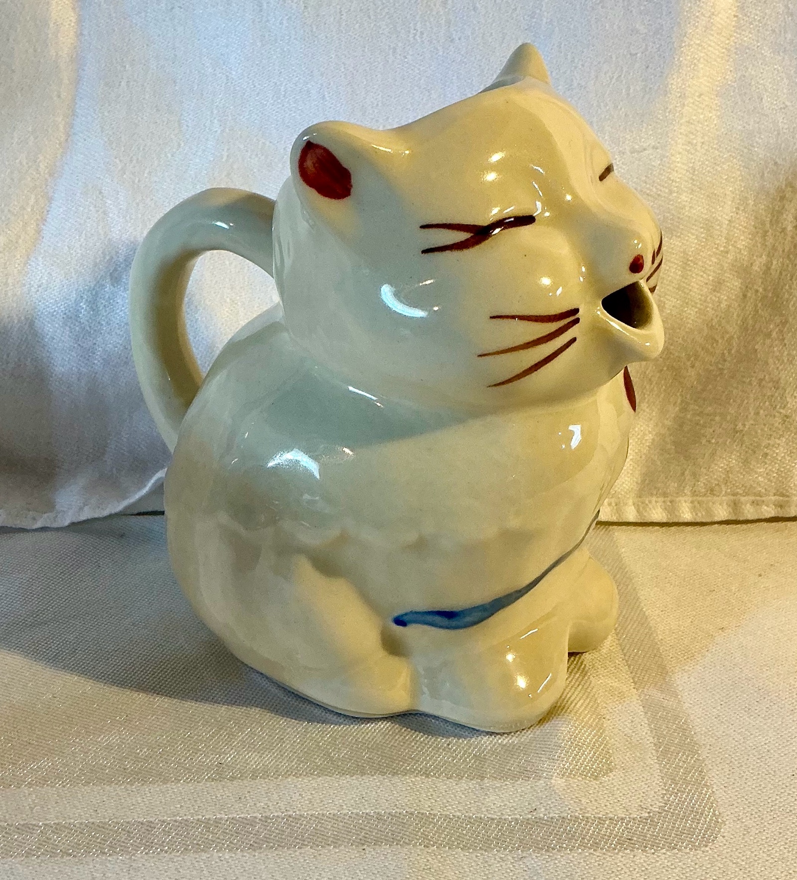Vintage Shawnee puss and boots pottery cat pitcher