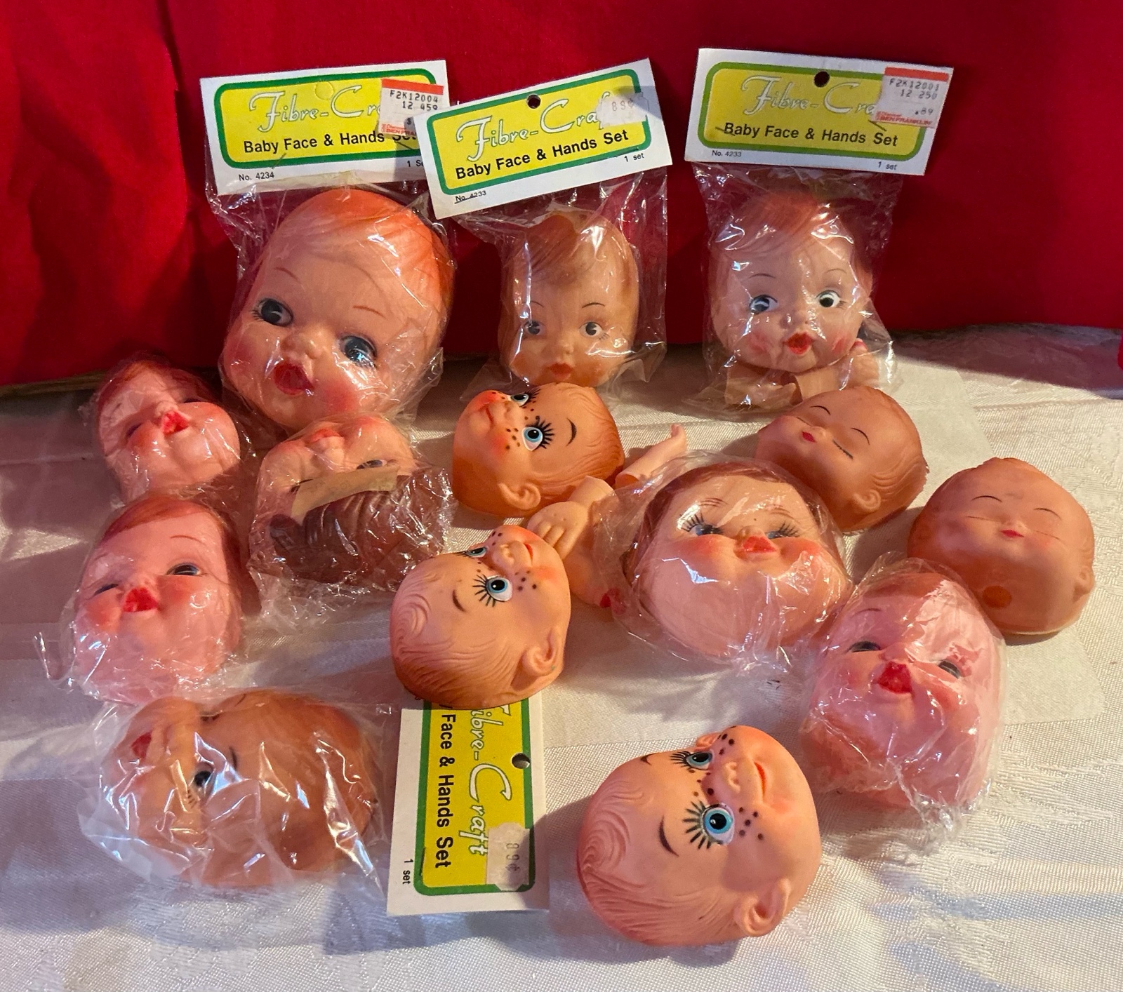 Group of 14 craft plastic baby faces & hands fibre craft