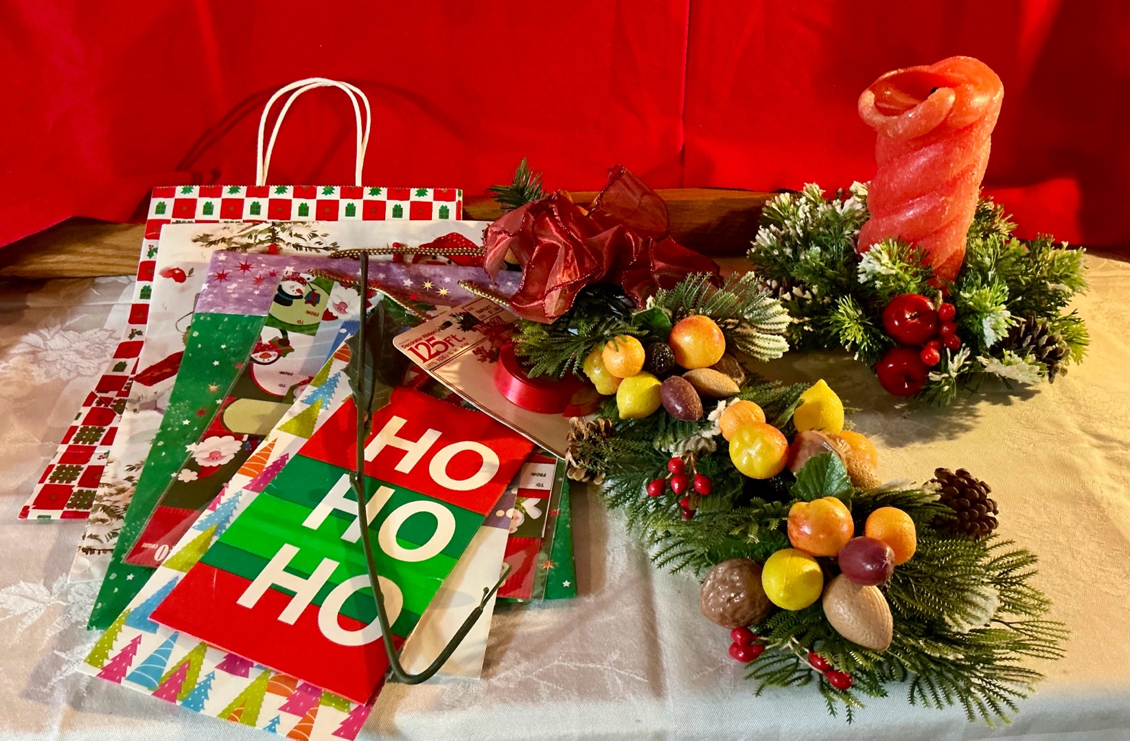 Group of vintage and newer christmas holiday decor and bags