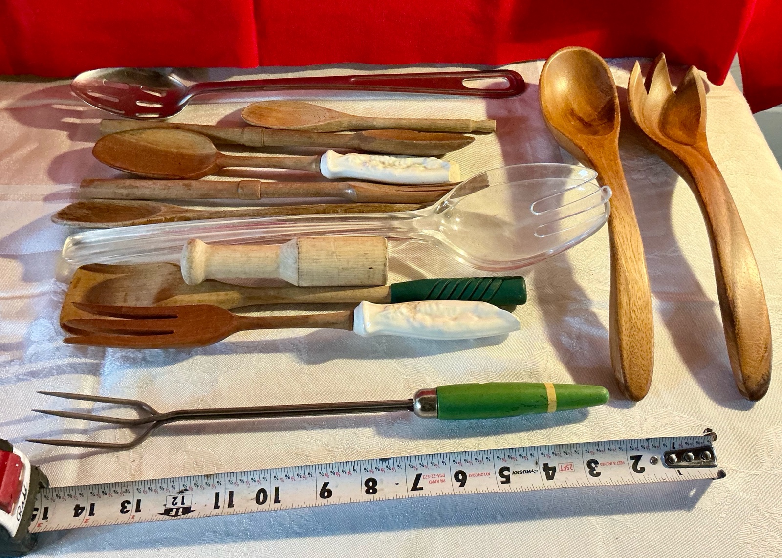 Vintage wooden salad forks and spoons and various utensils monkey pod