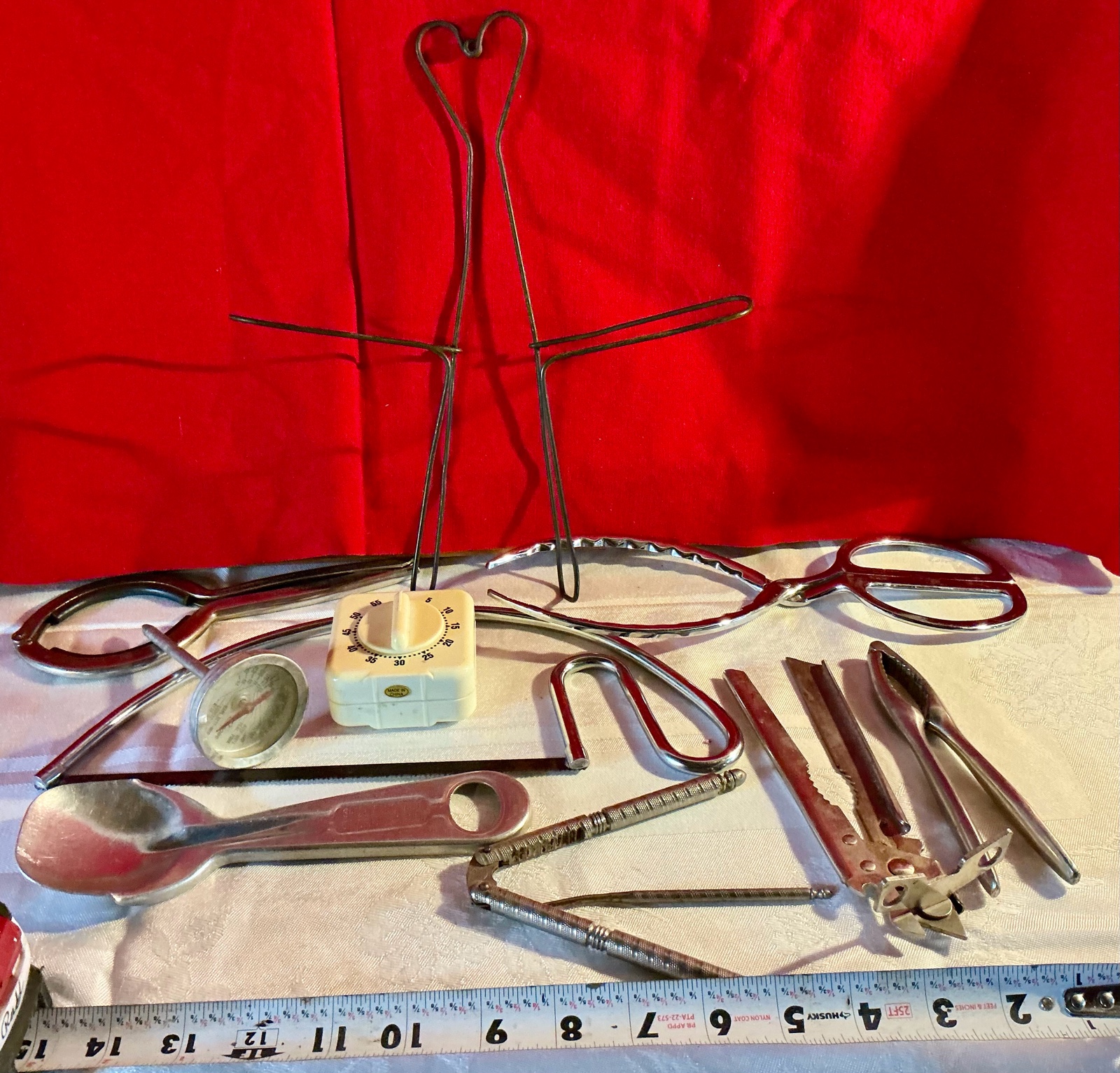 Vintage various kitchen utensils and pan lid holder