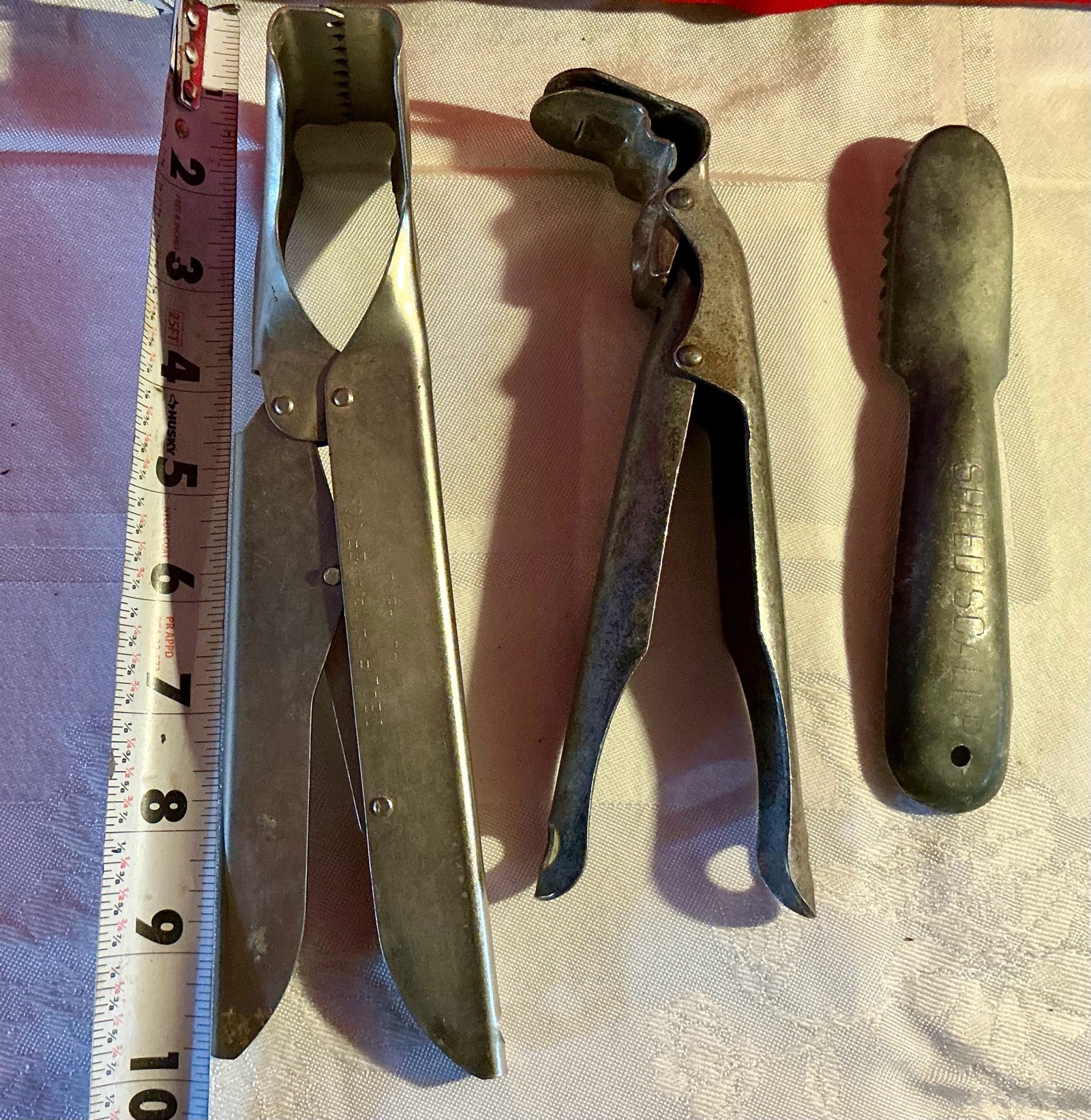 Vintage fish grippers and scaler tool