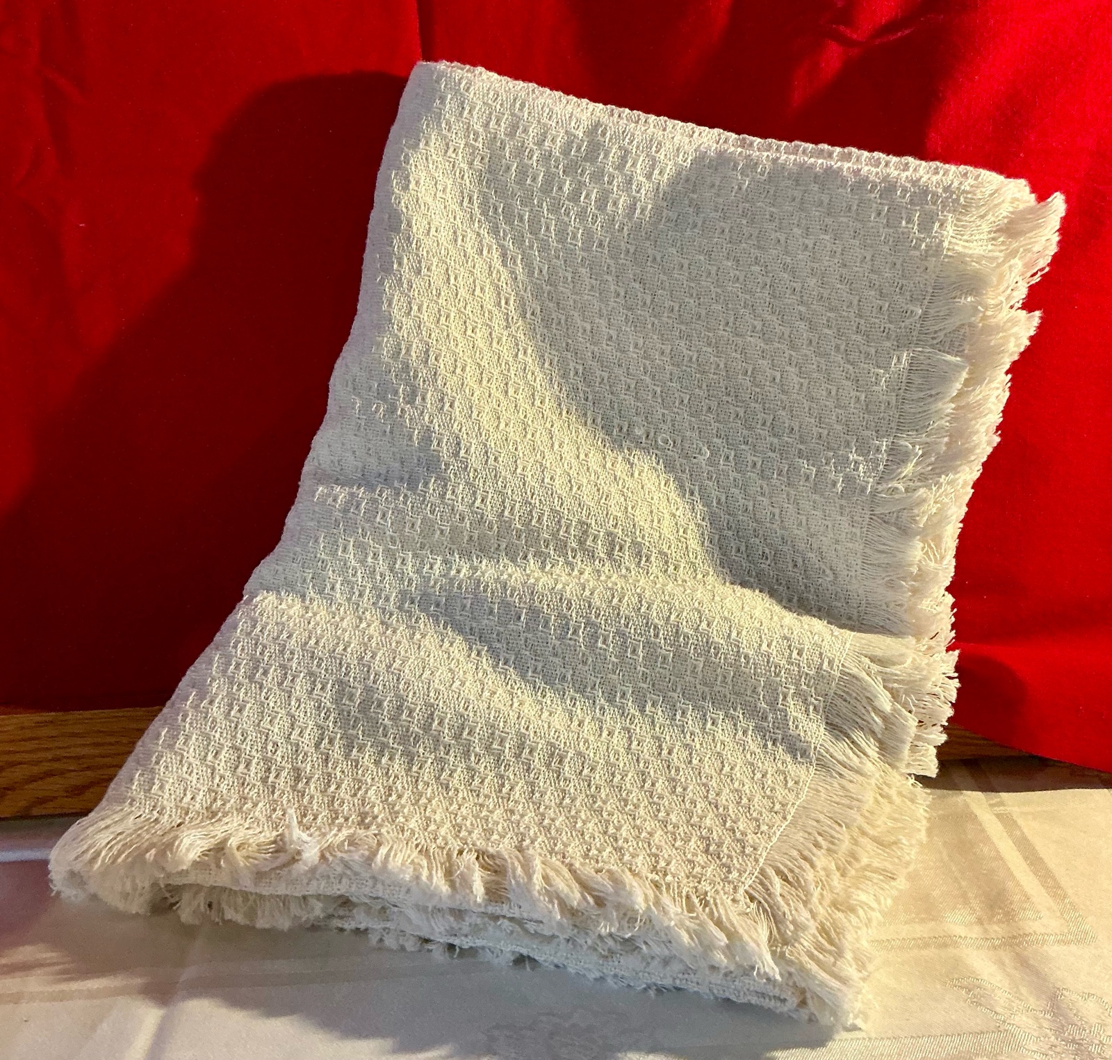 Ecru colored cotton blend throw blanket lattice work design