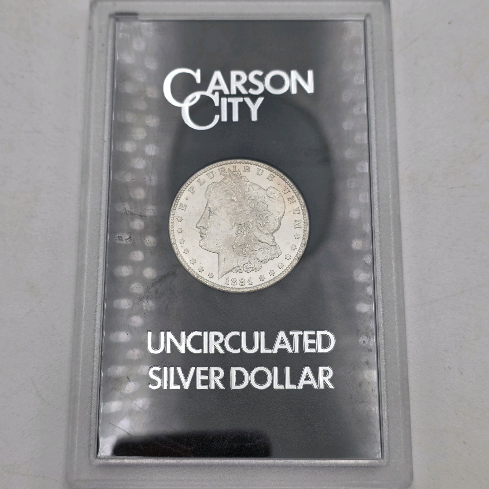 1884-CC Morgan Silver Dollar  Carson City  90% Silver  .77344 Troy Oz Silver  Holder