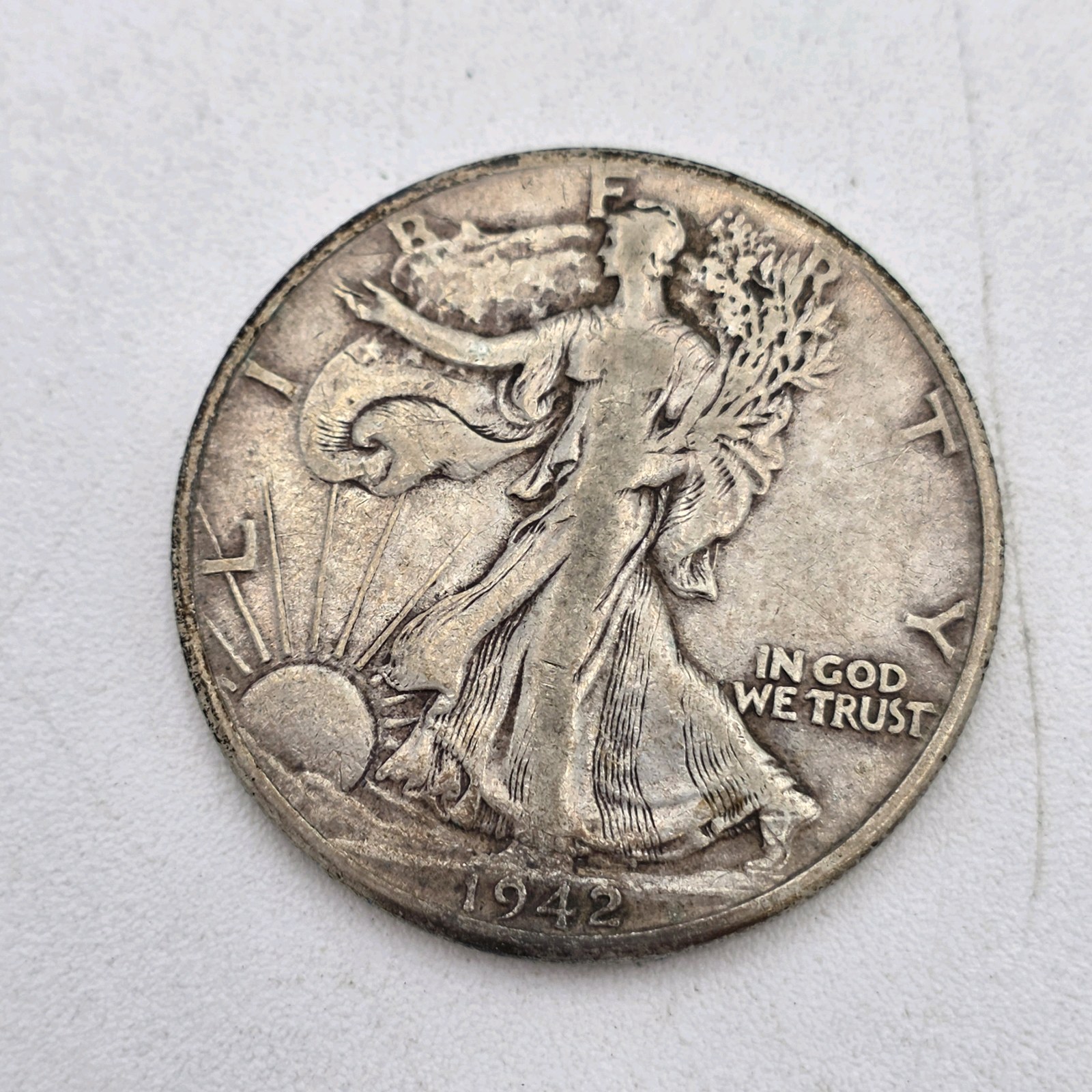 1942 Walking Liberty Half Dollar  90% Silver  .36169 Troy Oz Silver  WWII Era U.S. Coin