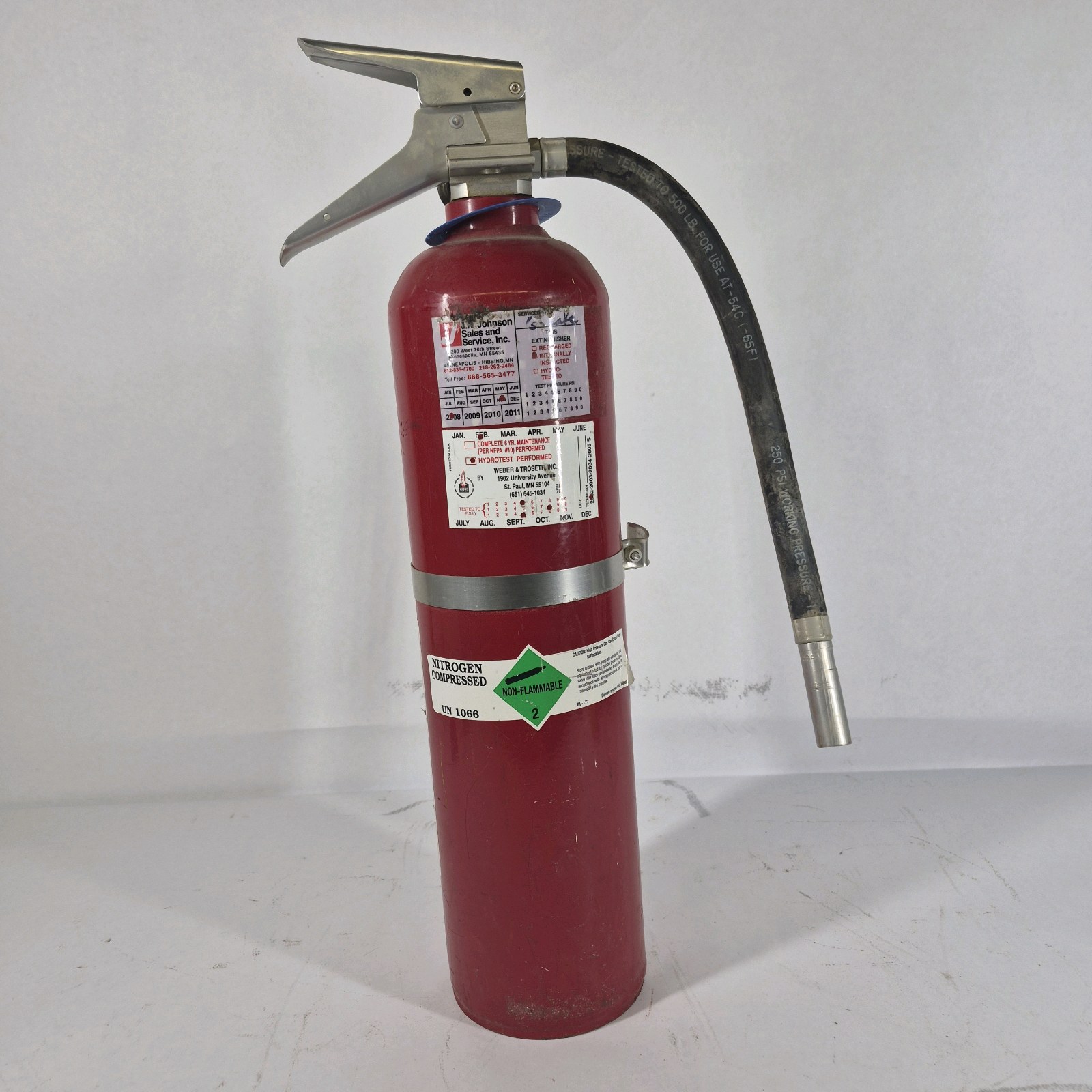 Red Fire Extinguisher with Hose and Nozzle