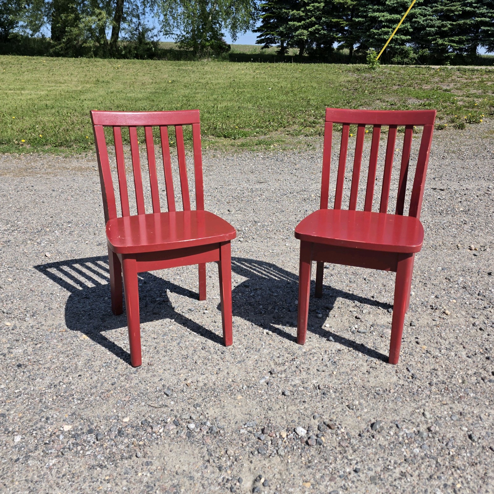 2 small red chairs 132