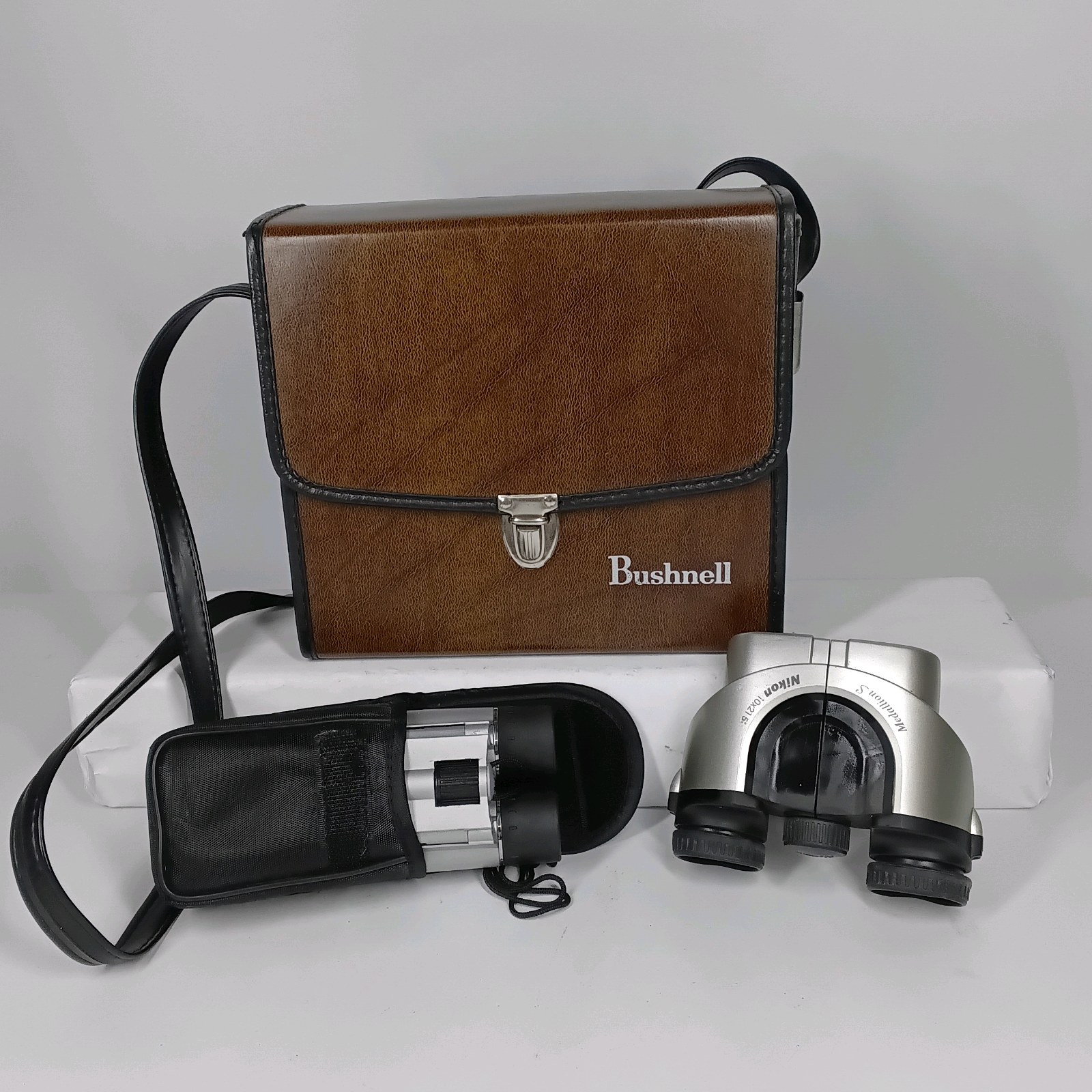 Lot of Bushnell Case and Compact Binoculars