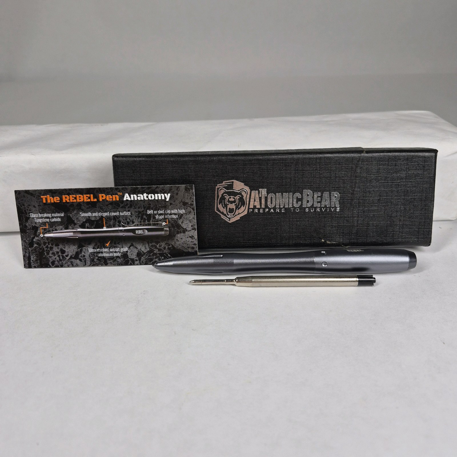 The Atomic Bear Rebel Pen Tactical Glass Breaker Pen