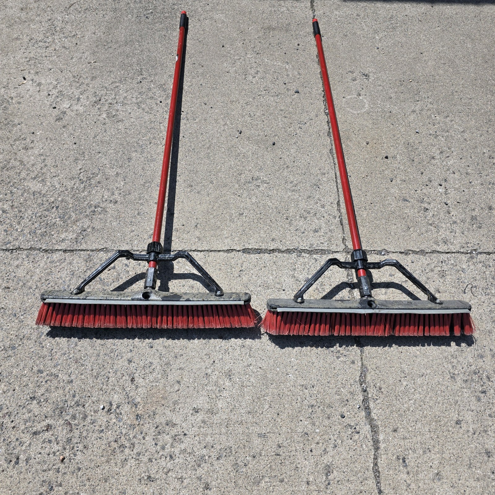 Lot of 2 Push Brooms with Red Handles and Wide Brush Heads