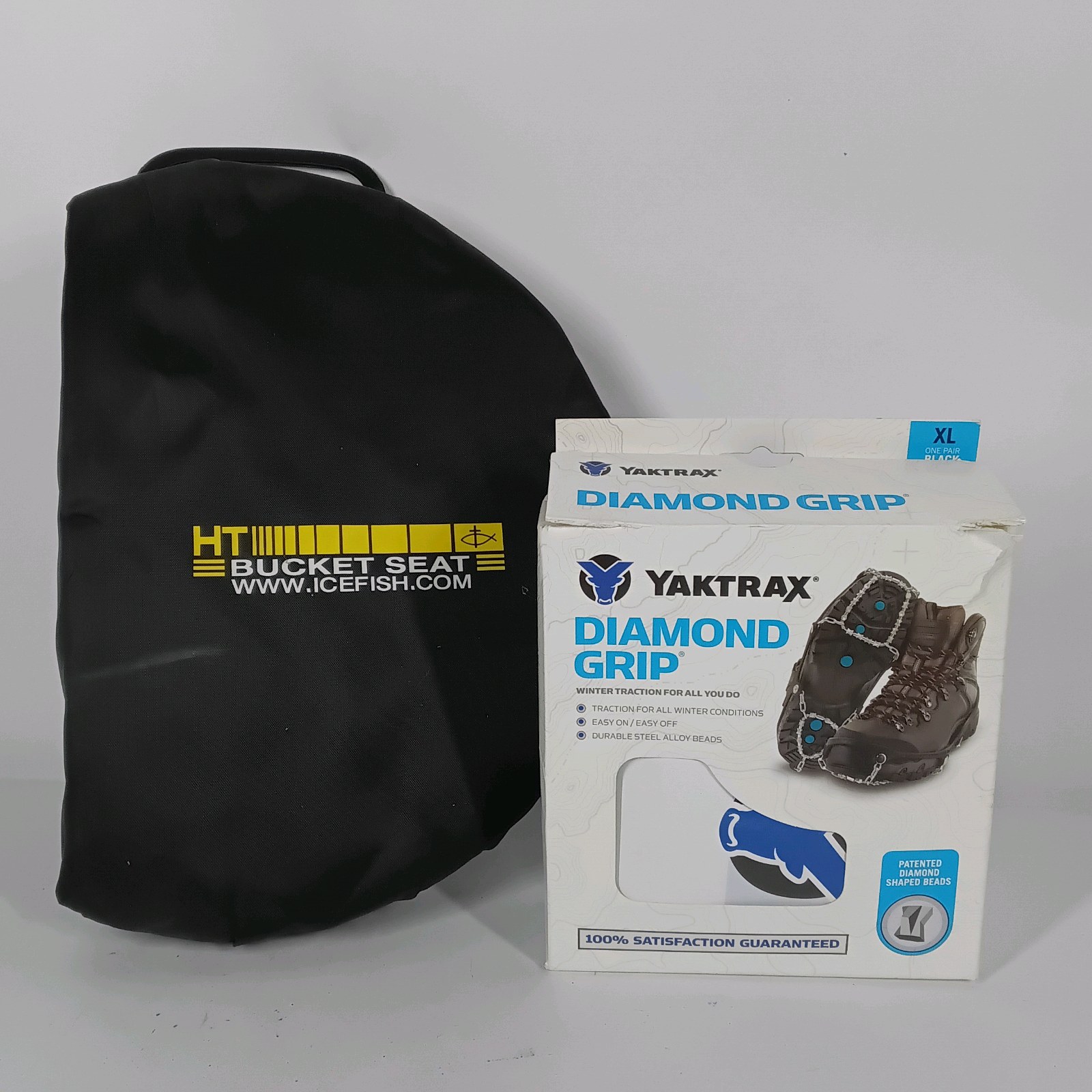 Yaktrax Diamond Grip black XL ice traction cleats with metal coil traction. Hillsound bucket seat bag and Yaktrax packaging shown.