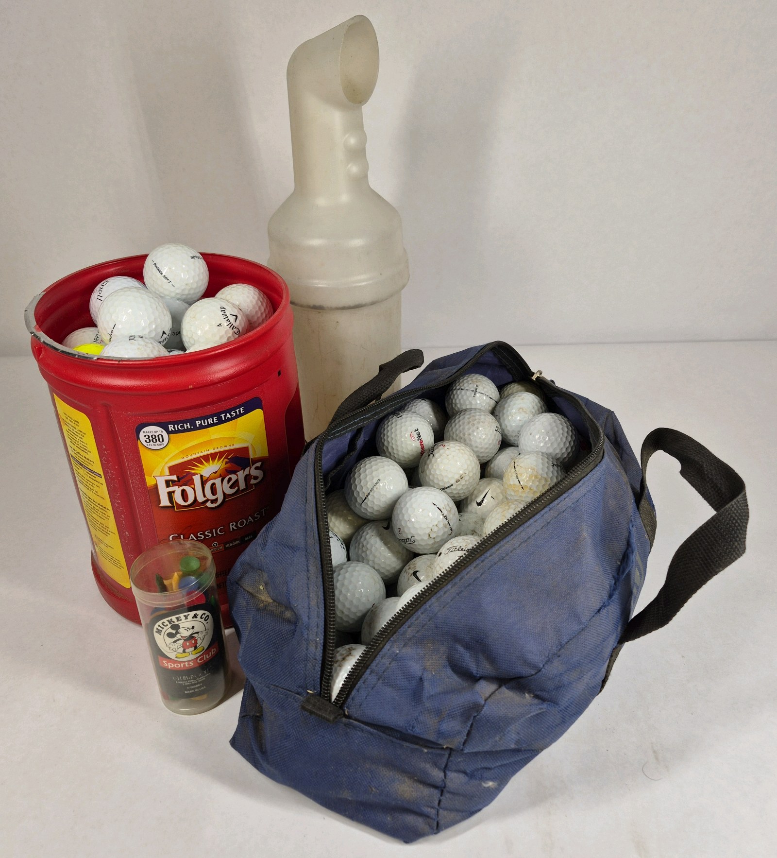 Lot of Golf Balls, Range Bag, and Golf Ball Shag Tube